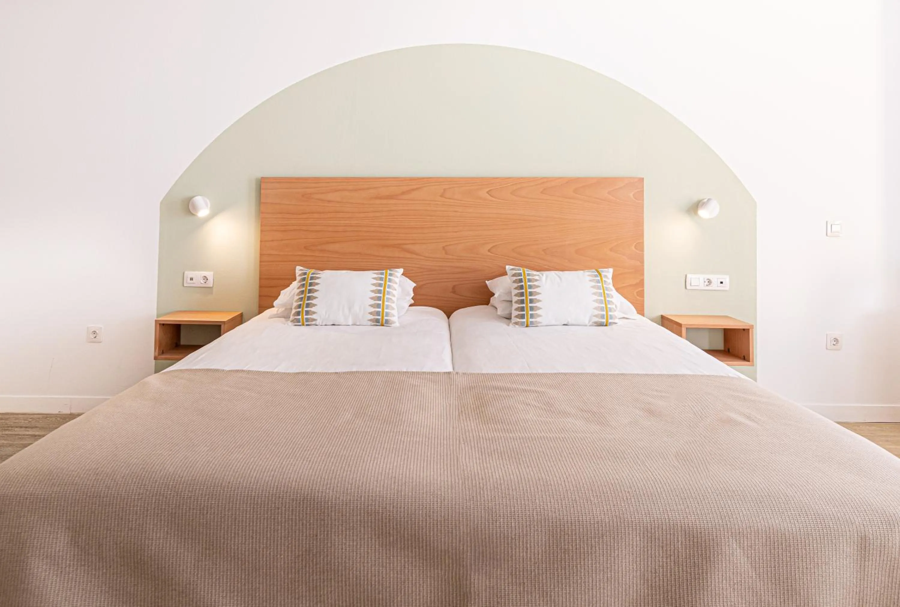 Bed in Atlantic Holiday Hotel