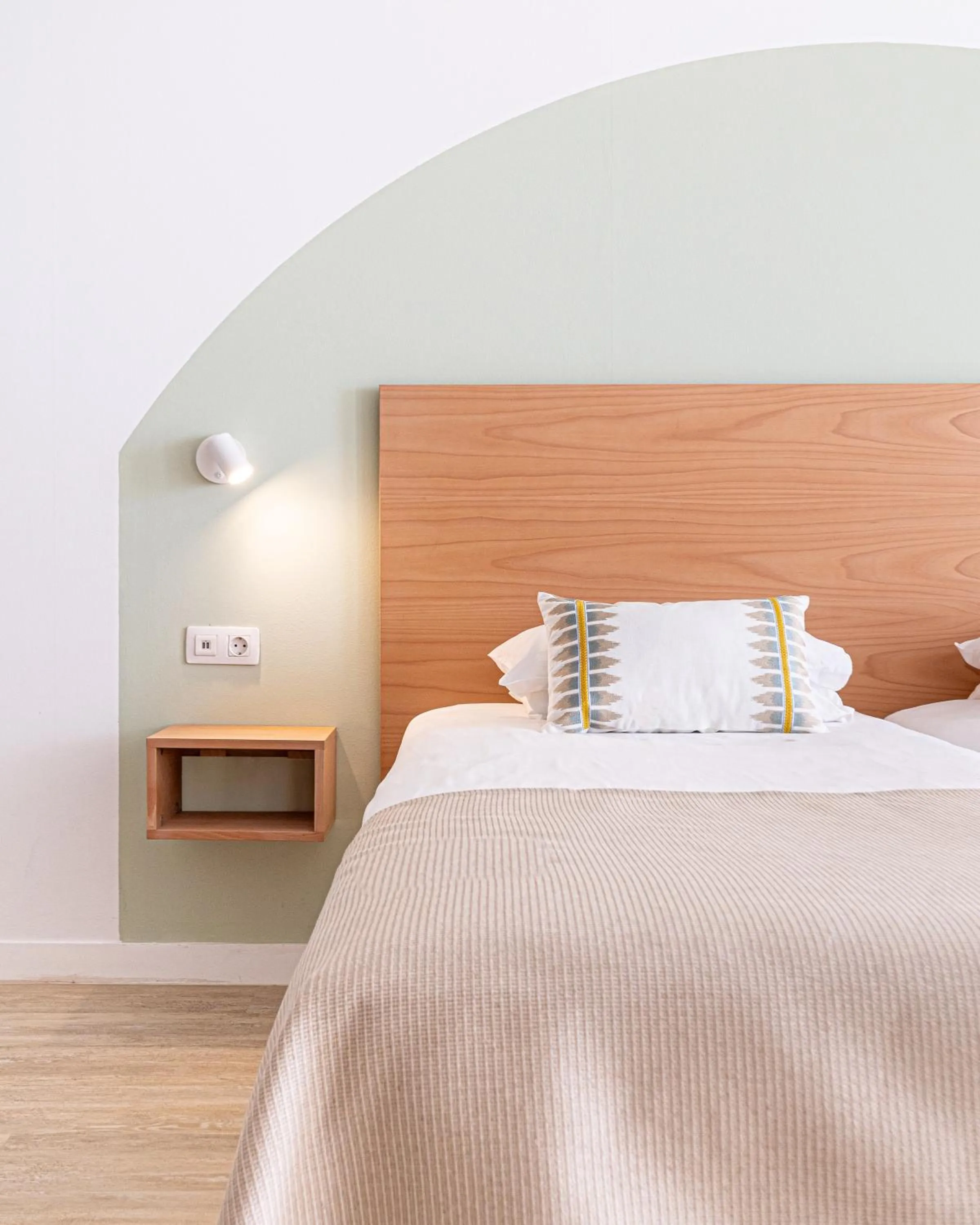 Bed in Atlantic Holiday Hotel