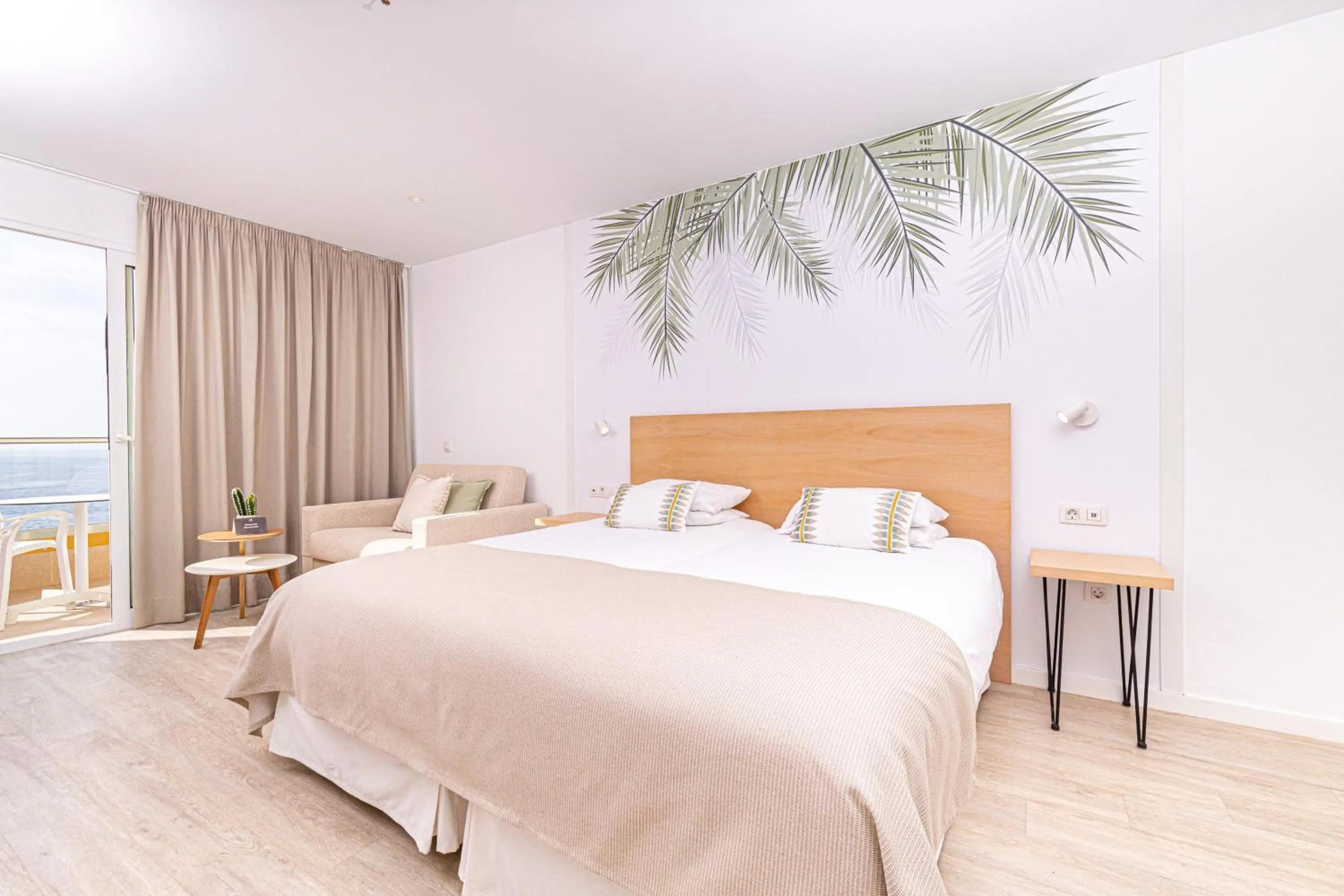 Bed in Atlantic Holiday Hotel