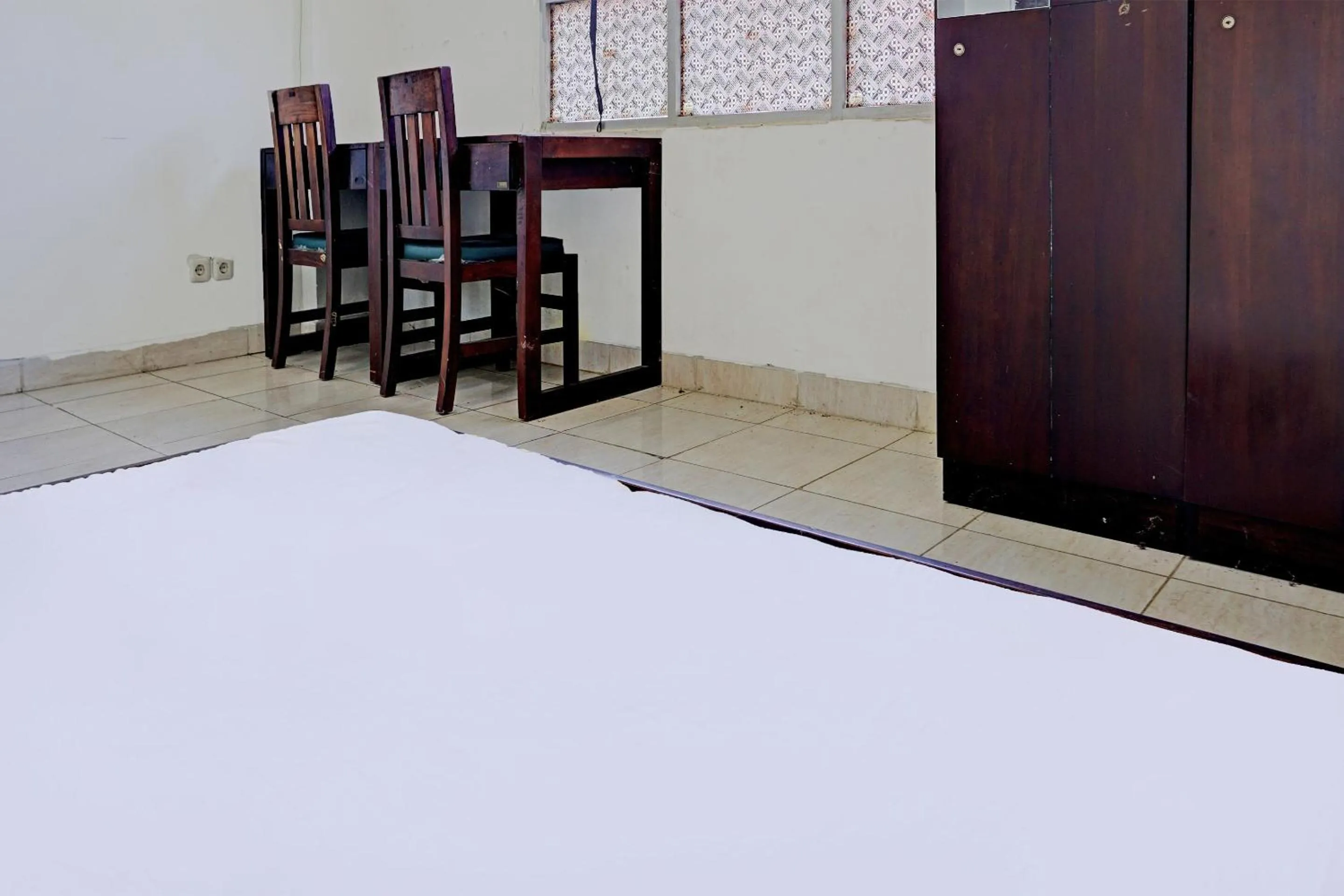 Bedroom in SPOT ON 92374 Penginapan Rusunawa