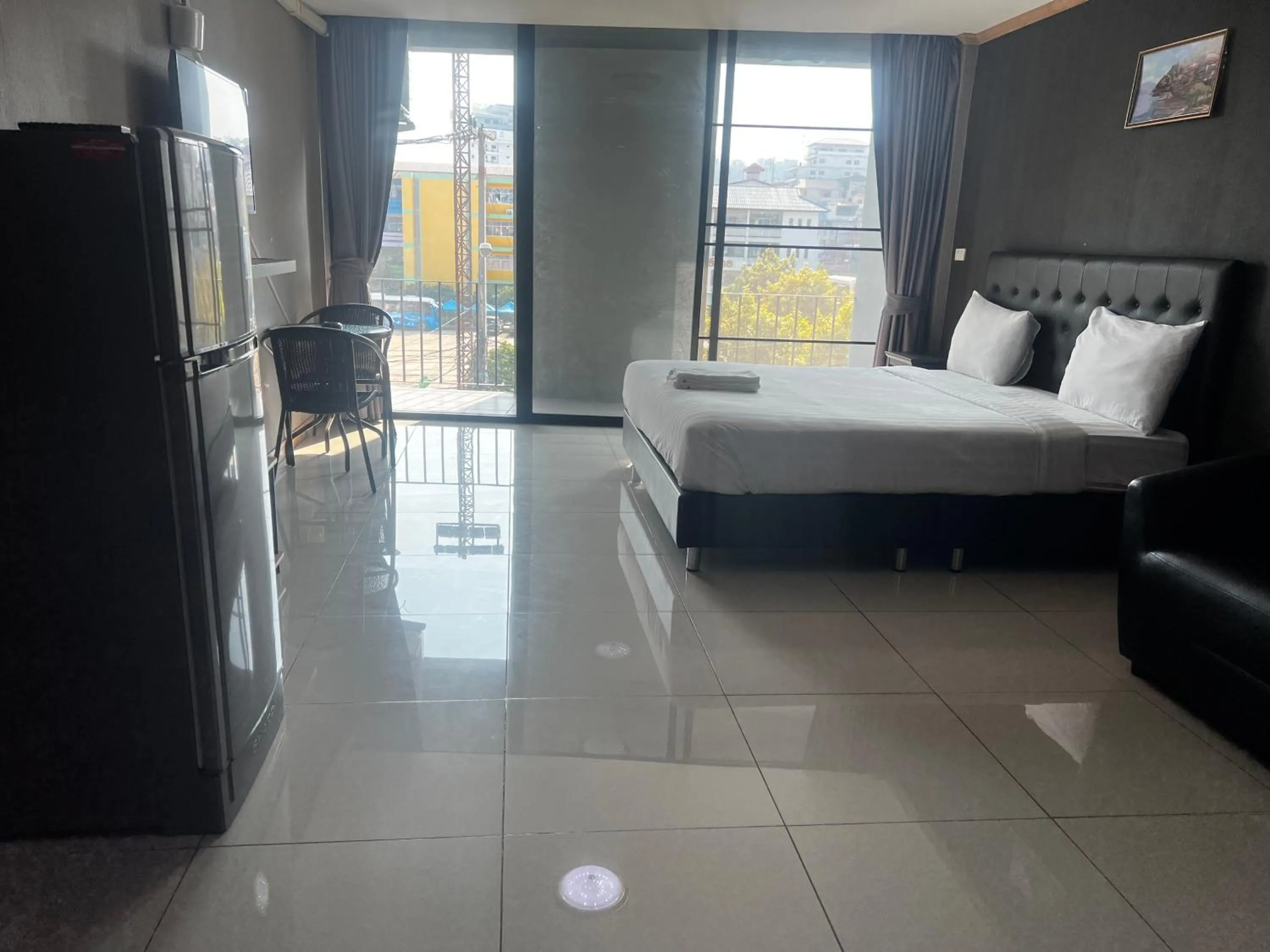 Photo of the whole room, Bed in Apsara Inn