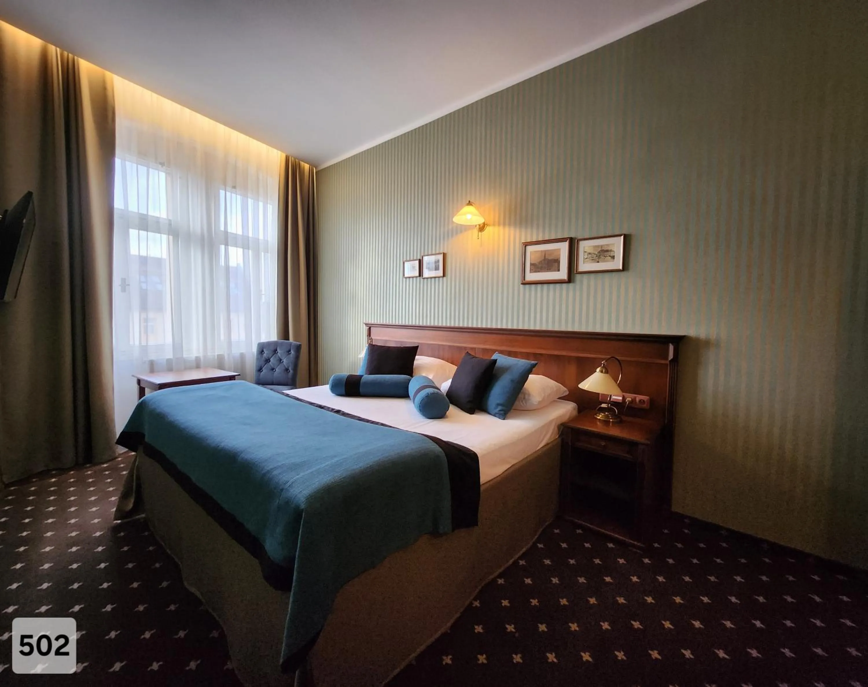 Bed in City Hotel Morris