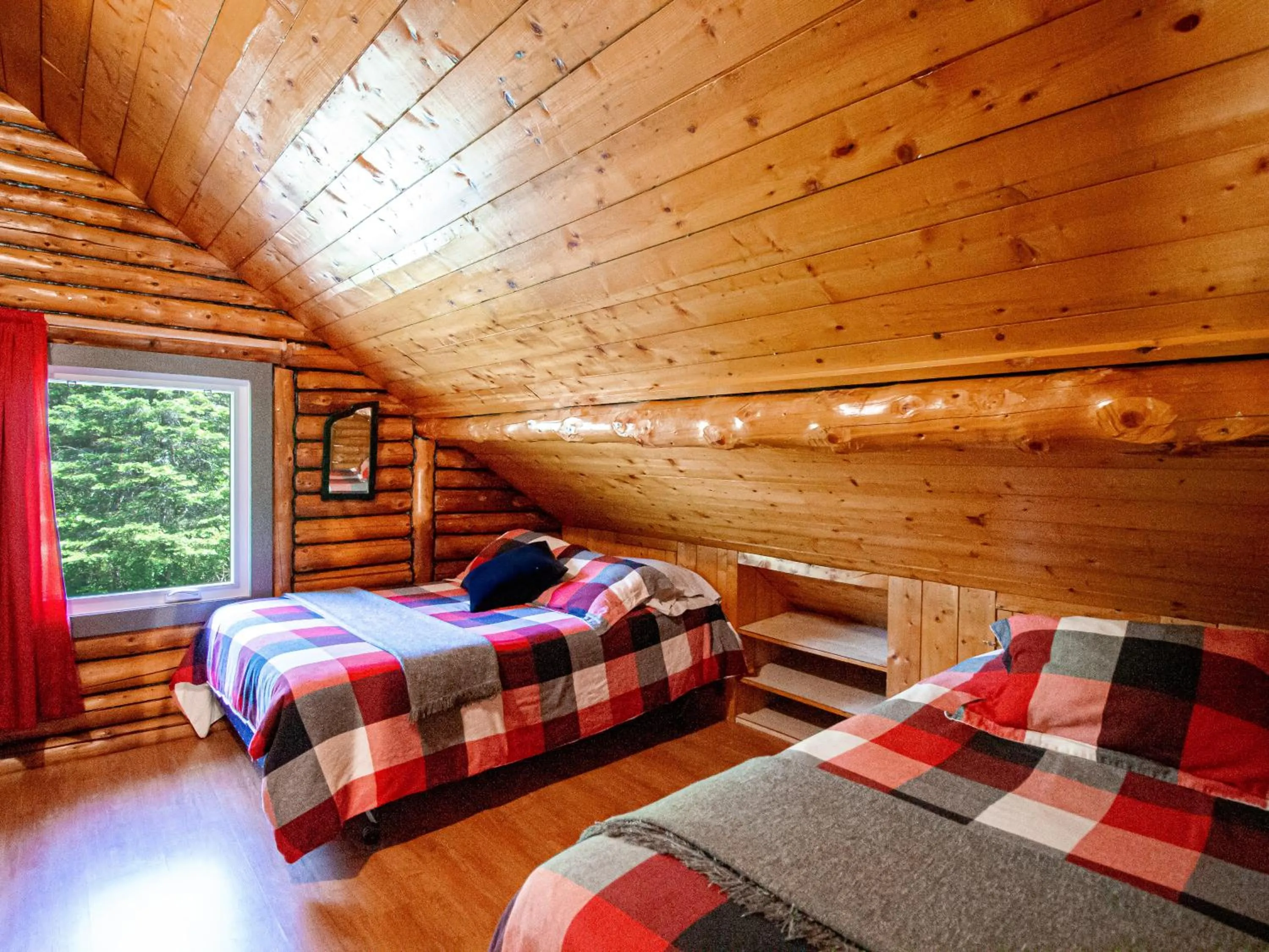Bed in Les Chalets Tourisma - Chalet en bois rond avec spa - Chalet du 4e