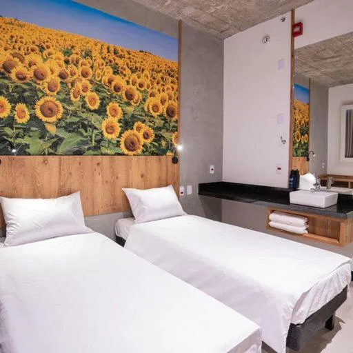 Photo of the whole room, Bed in CAMPOS DE HOLAMBRA INN
