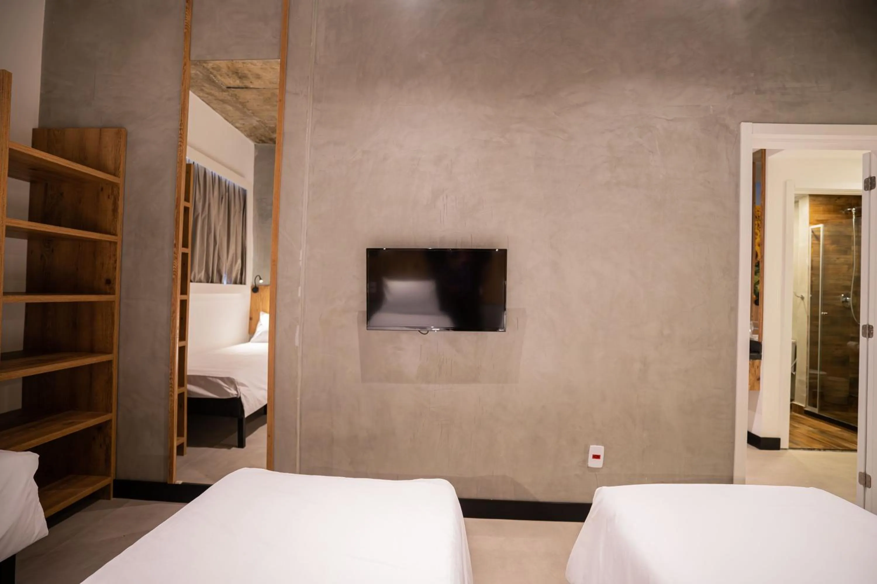 Photo of the whole room, Bed in CAMPOS DE HOLAMBRA INN