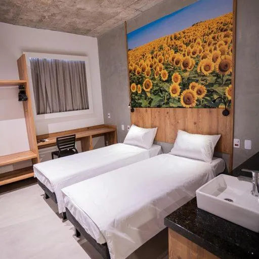 Photo of the whole room, Bed in CAMPOS DE HOLAMBRA INN