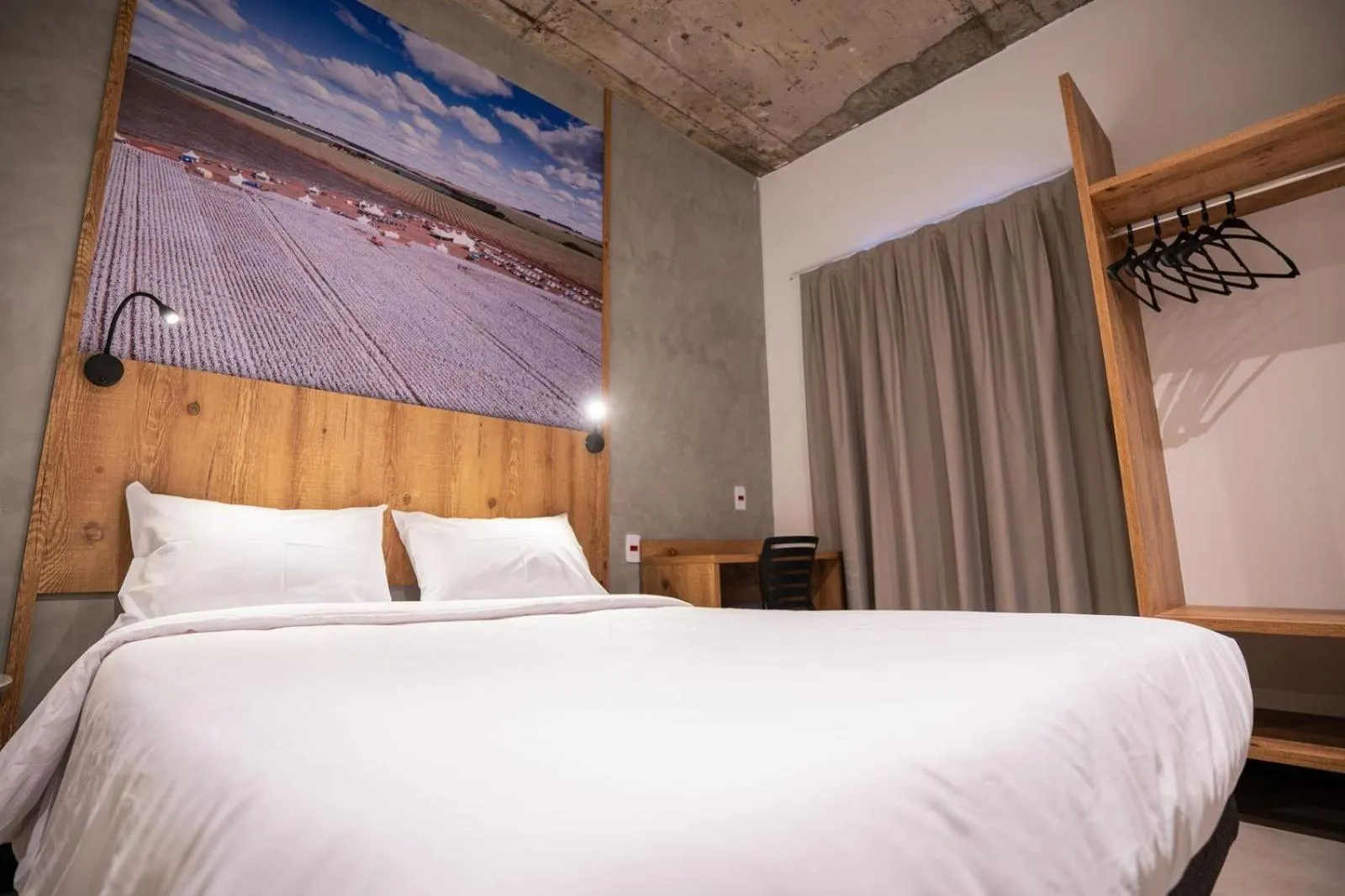 Photo of the whole room, Bed in CAMPOS DE HOLAMBRA INN