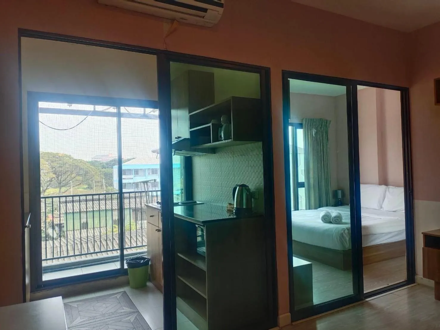 Balcony/Terrace, Bed in Deluxe Rooms by Suwan Style Agency