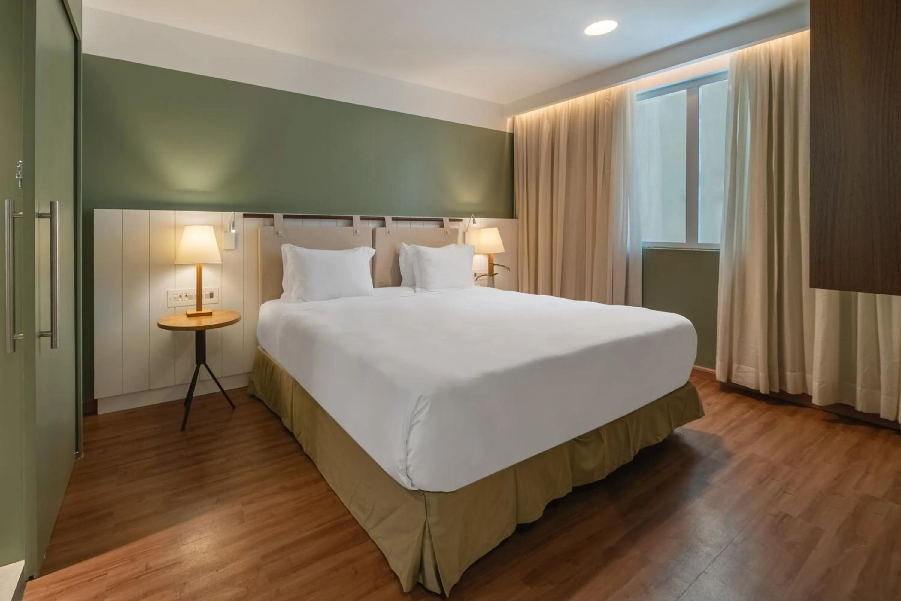 Bed in Grand Mercure Rio de Janeiro Copacabana