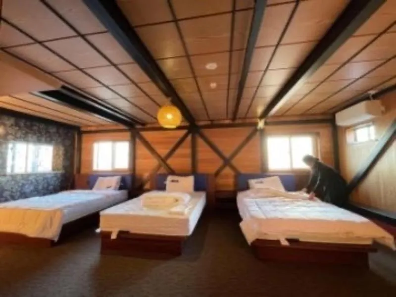 Bed in HOTEL COCOA RESORT