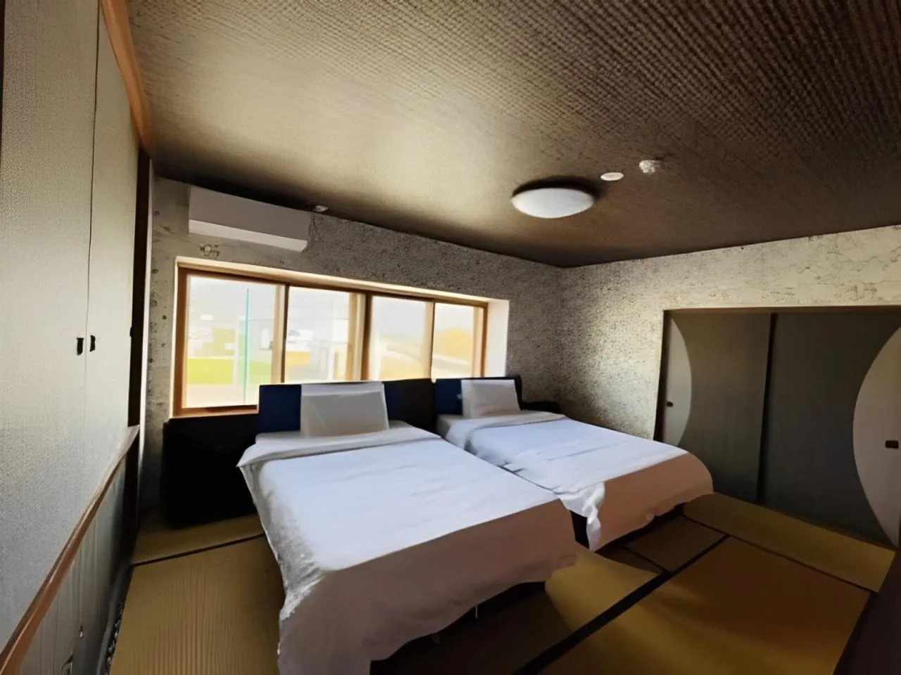 Bed in HOTEL COCOA RESORT