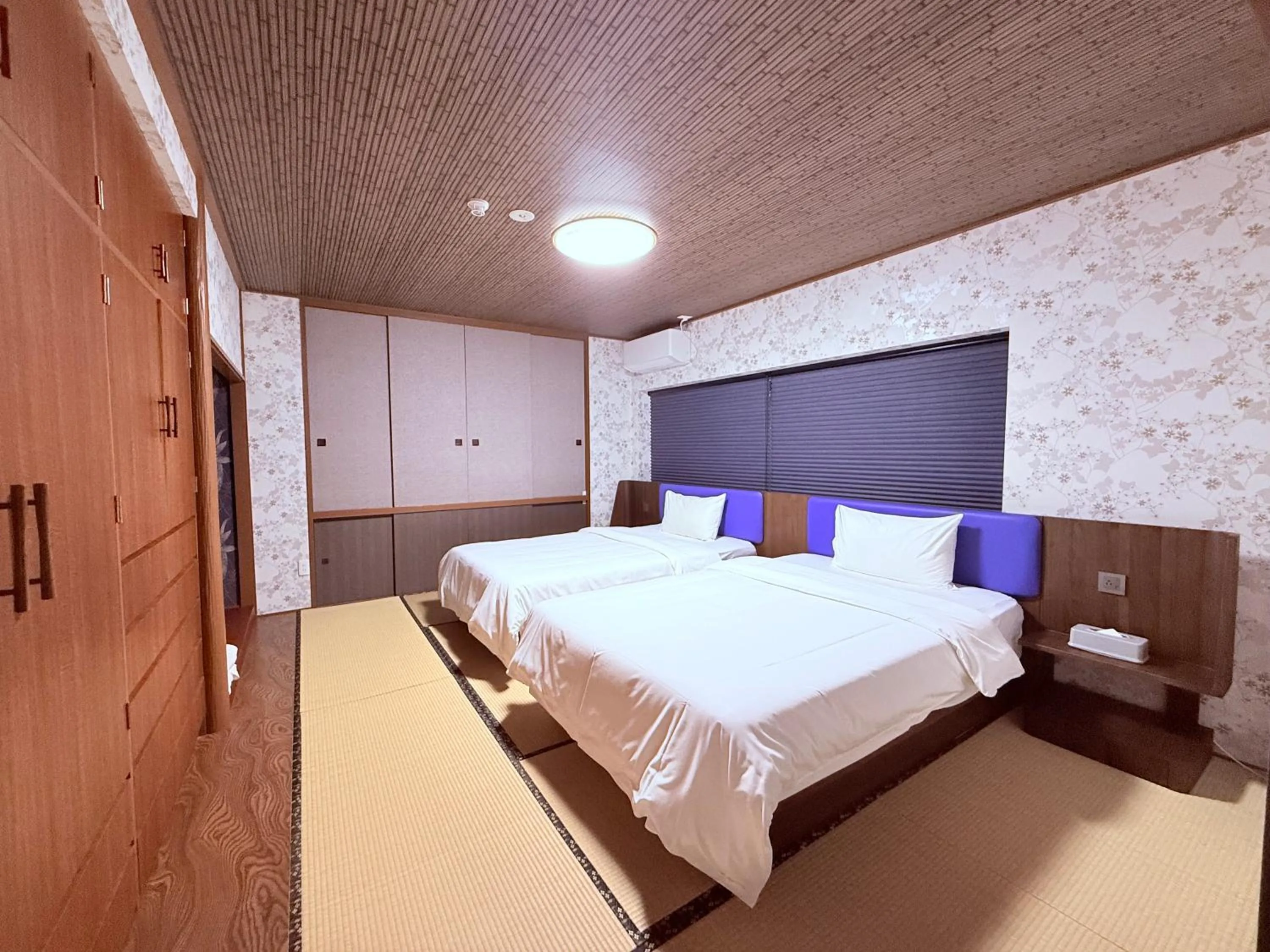 Bed in HOTEL COCOA RESORT