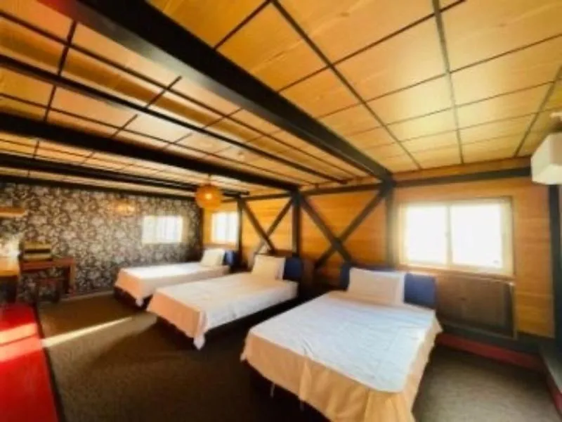 Bed in HOTEL COCOA RESORT