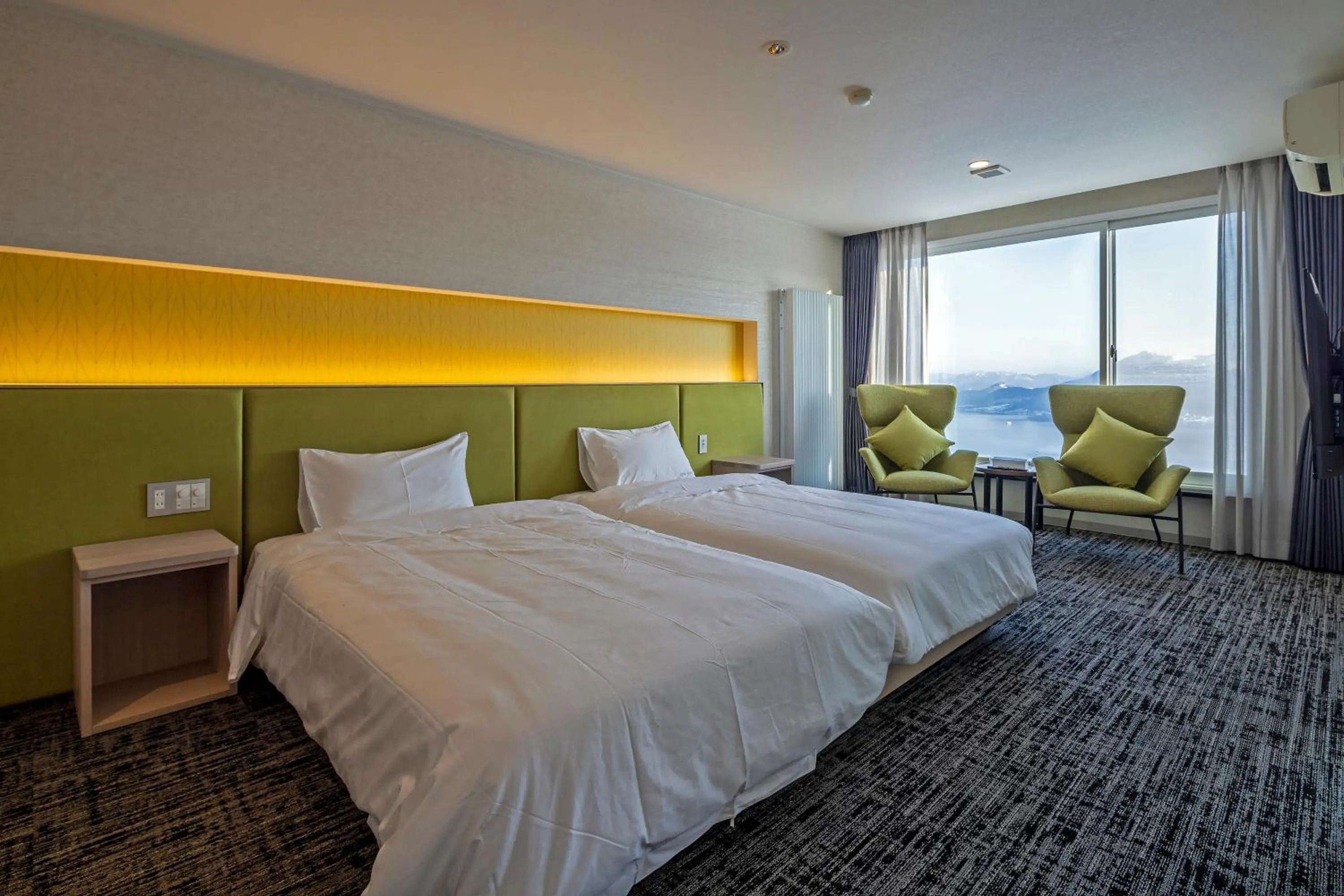 Bed in HOTEL COCOA RESORT