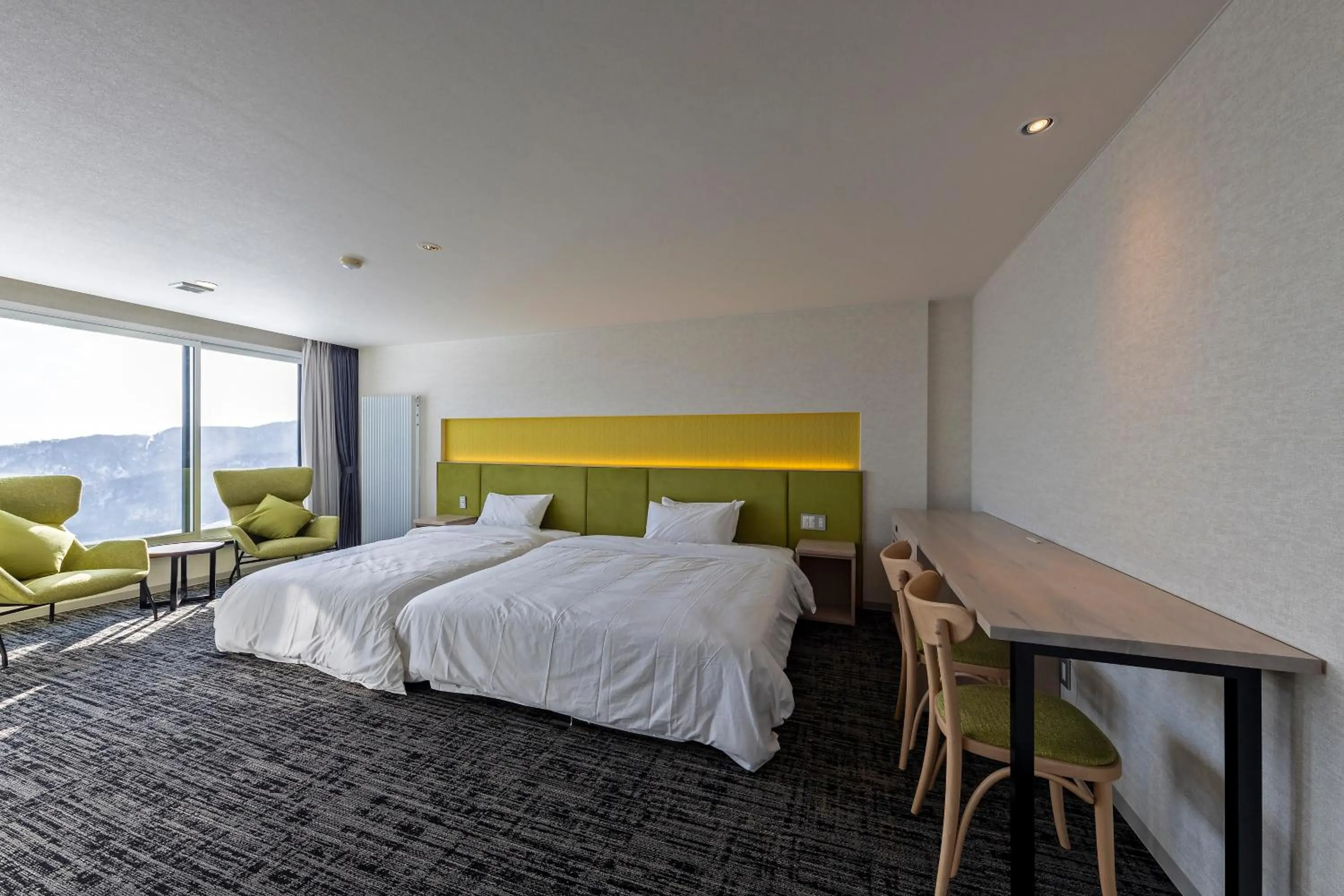 Bed in HOTEL COCOA RESORT