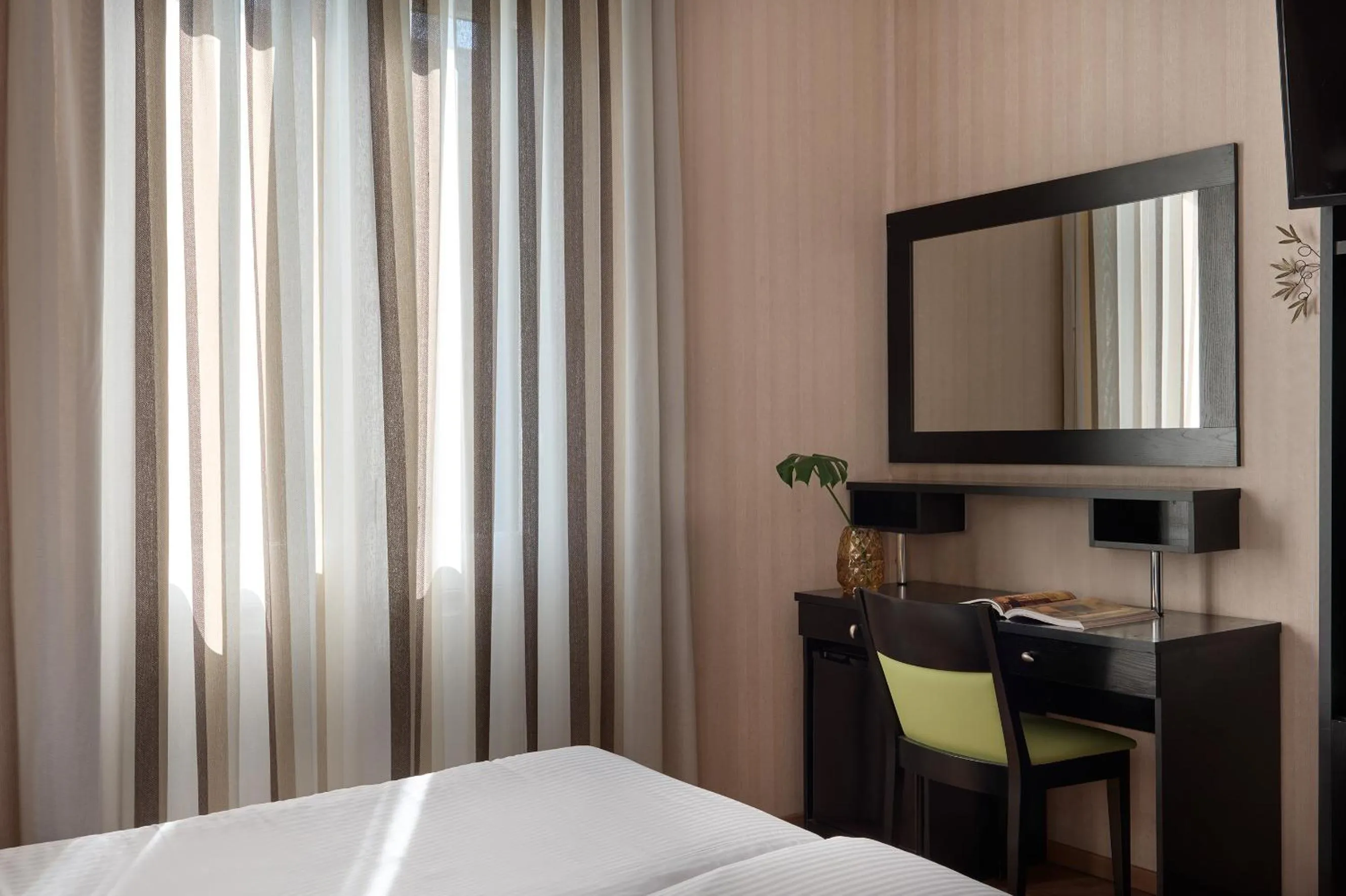 Bed in Delphi Art Hotel by Prima Hotels