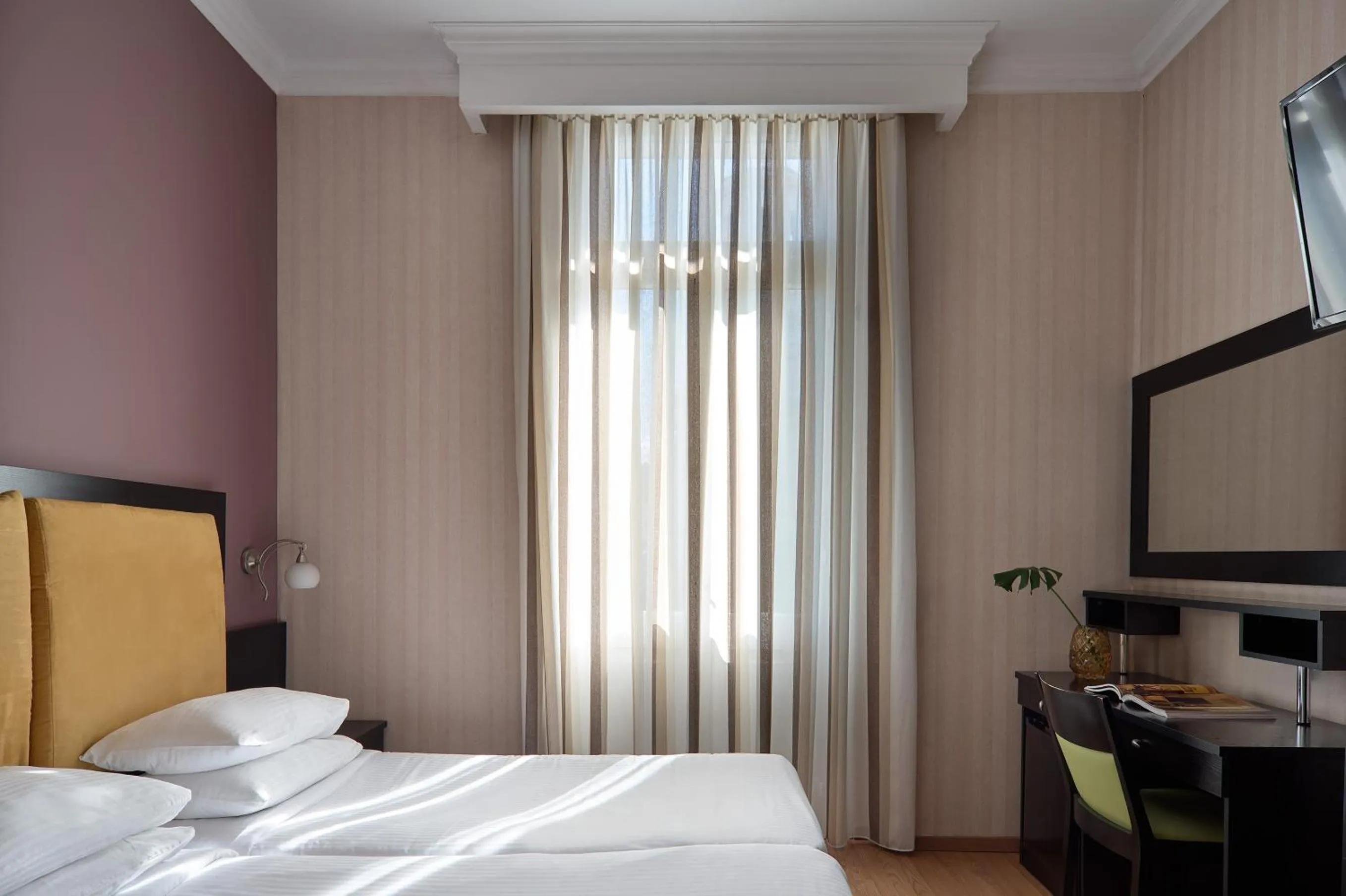 Bed in Delphi Art Hotel by Prima Hotels