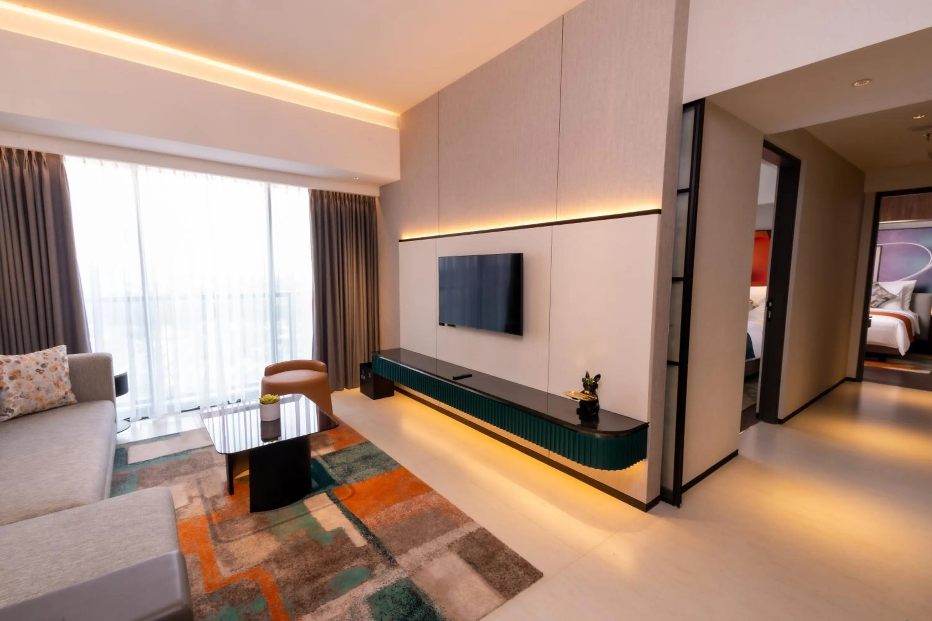 Communal lounge/ TV room, Bed in Herloom Hotel & Residence BSD Tangerang