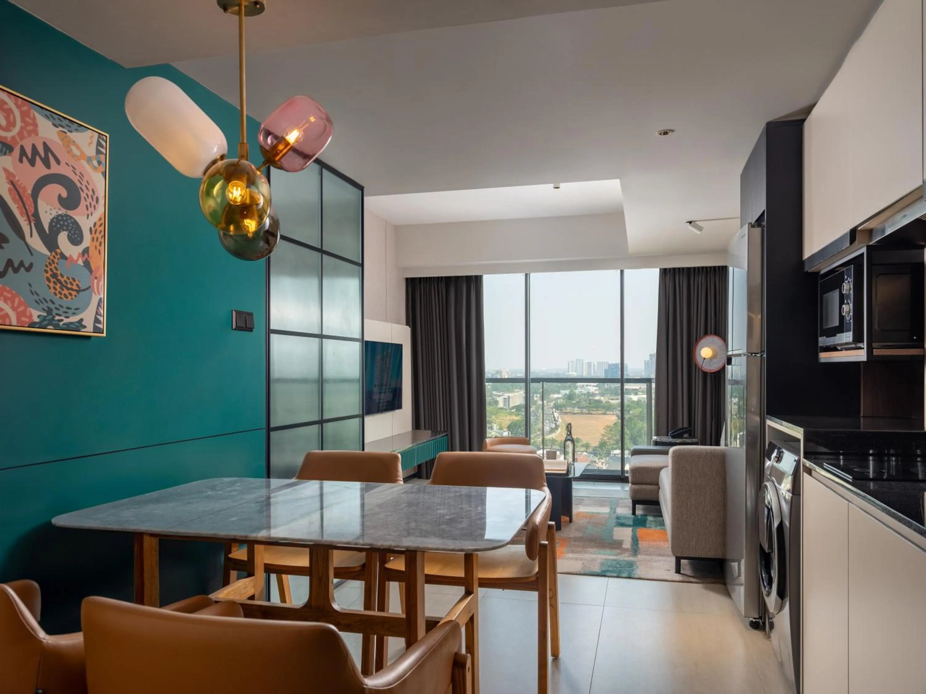 Kitchen or kitchenette in Herloom Hotel & Residence BSD Tangerang