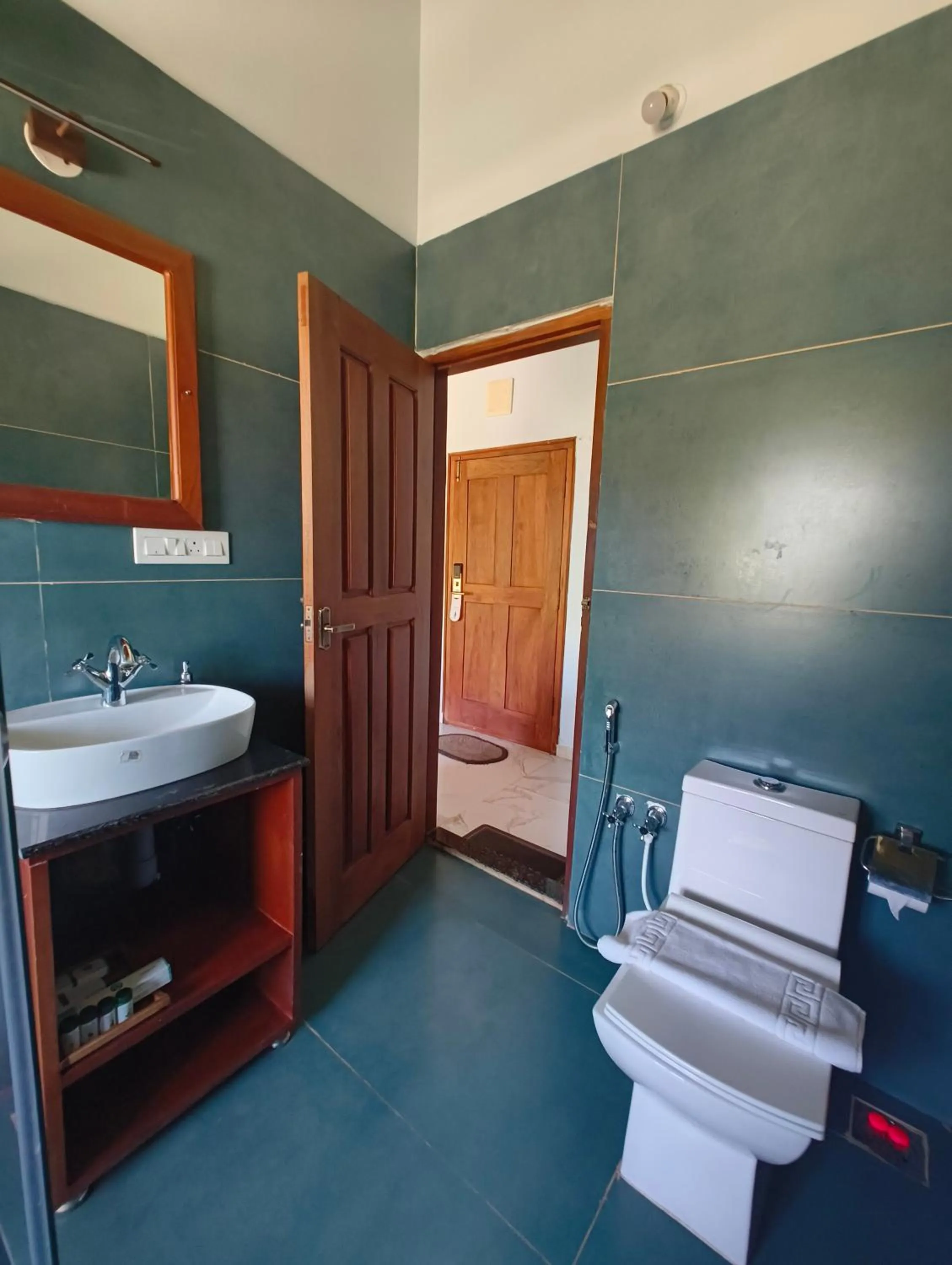 Bathroom in Hill Crest Resort - Coorg