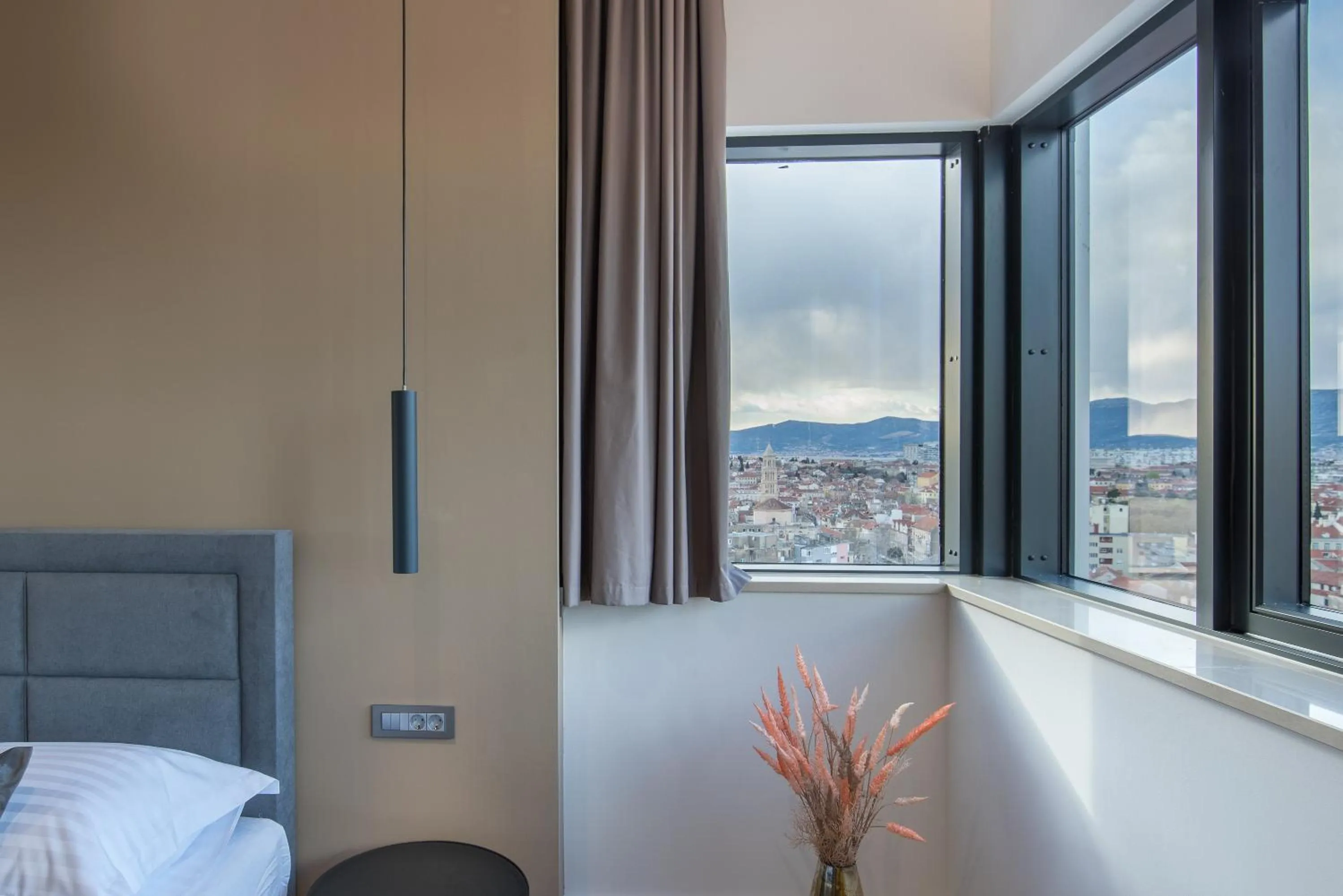 Bed in Seascape Luxury Rooms