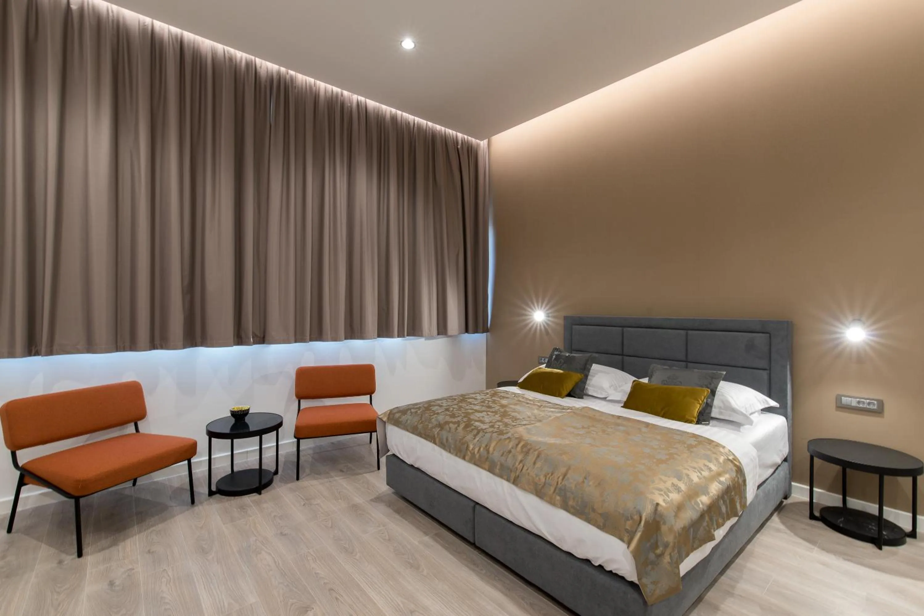 Bed in Seascape Luxury Rooms