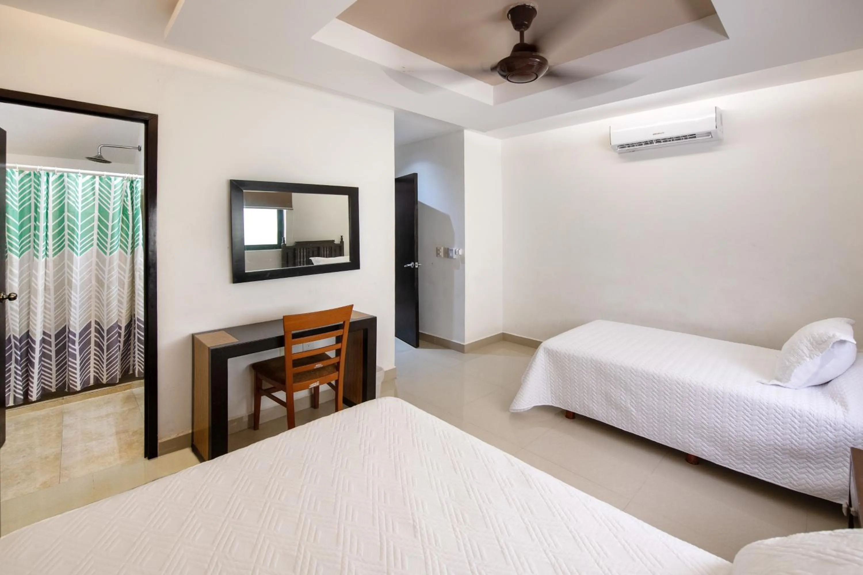 Bedroom, Bed in Family Vacations apartment Ocean View