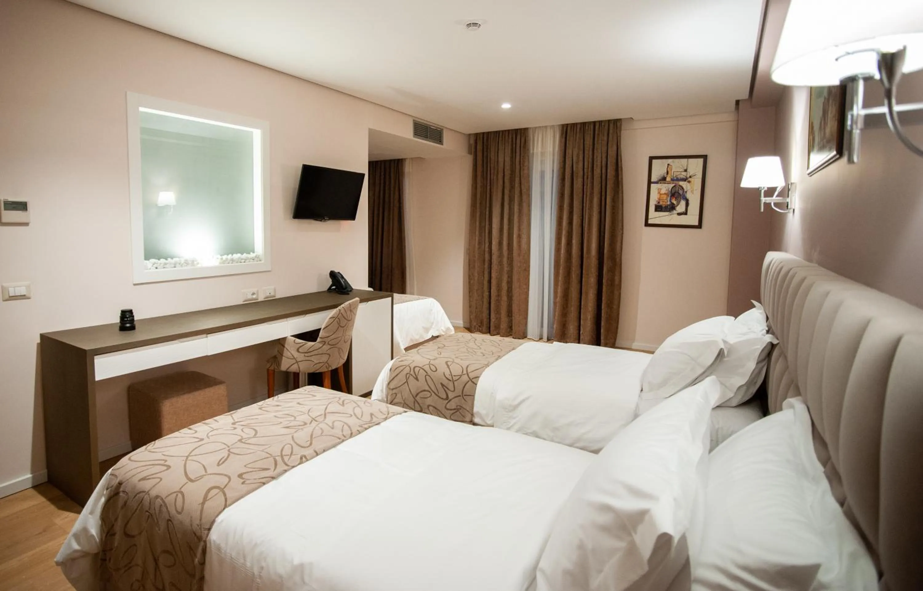 Bed in Doanesia Premium Hotel & Spa