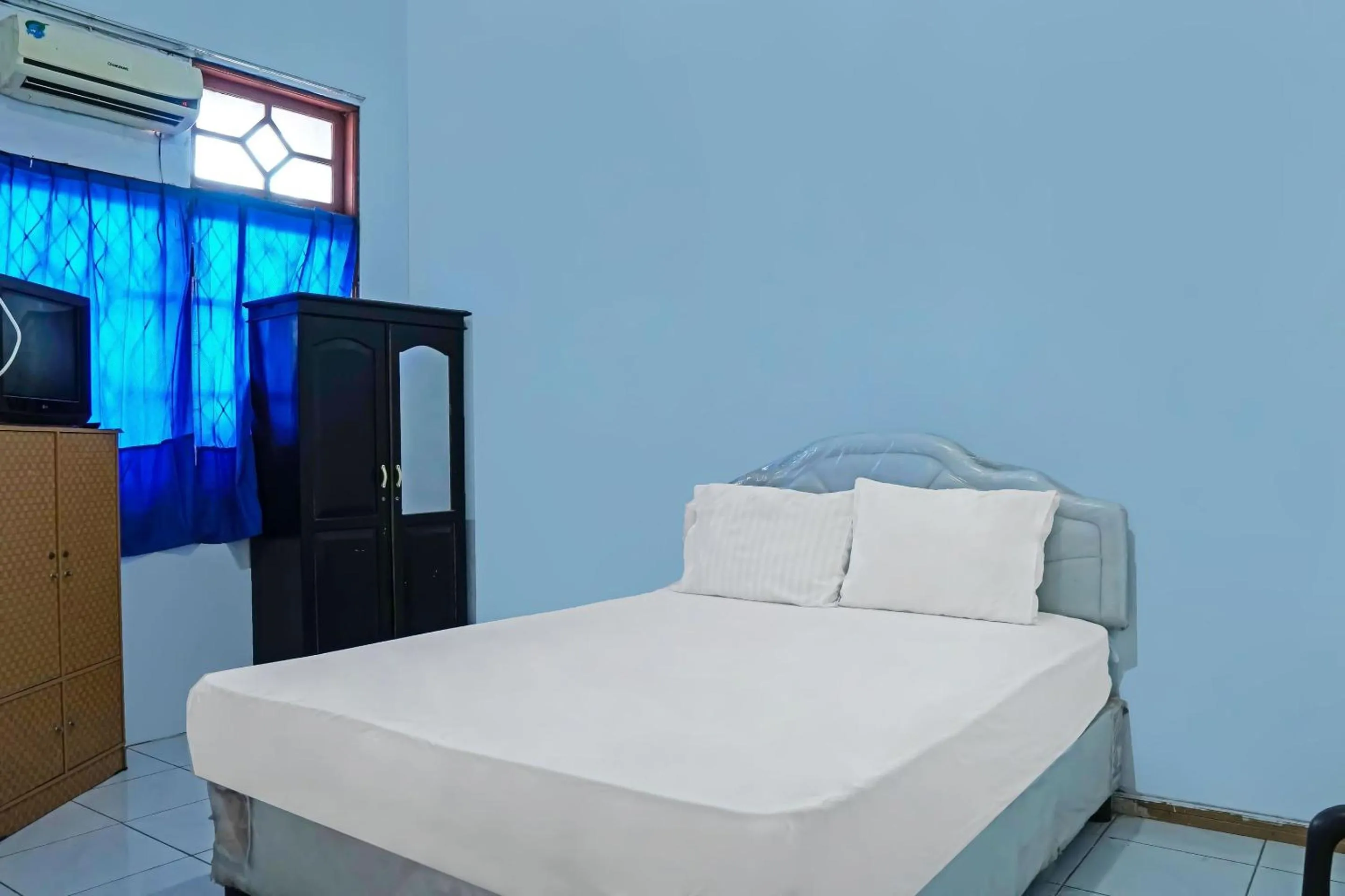 Bedroom, Bed in Hotel O Wilma Kost Syariah