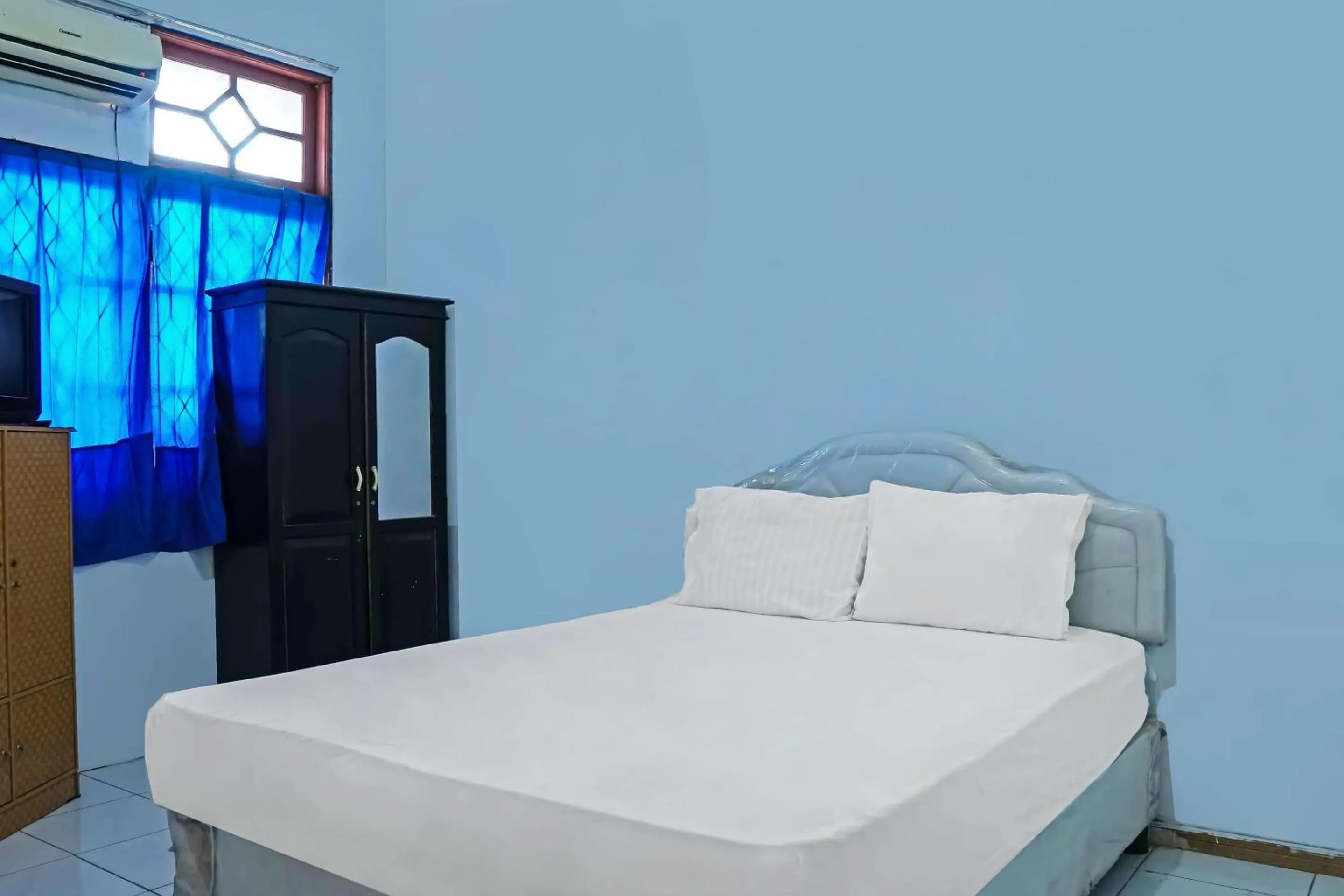 Bedroom, Bed in Hotel O Wilma Kost Syariah