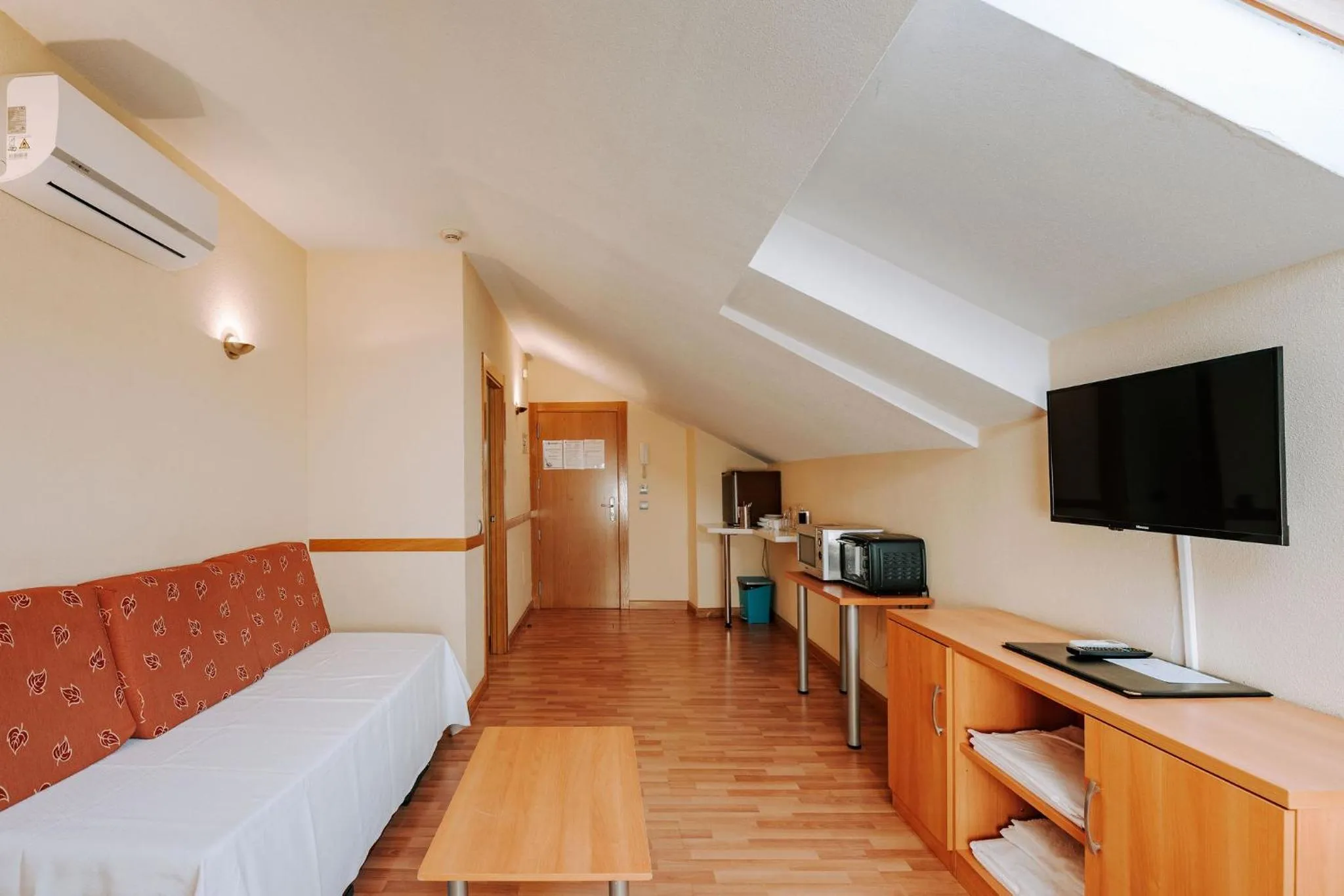 Living room, Bed in JCH Congreso Apartamentos