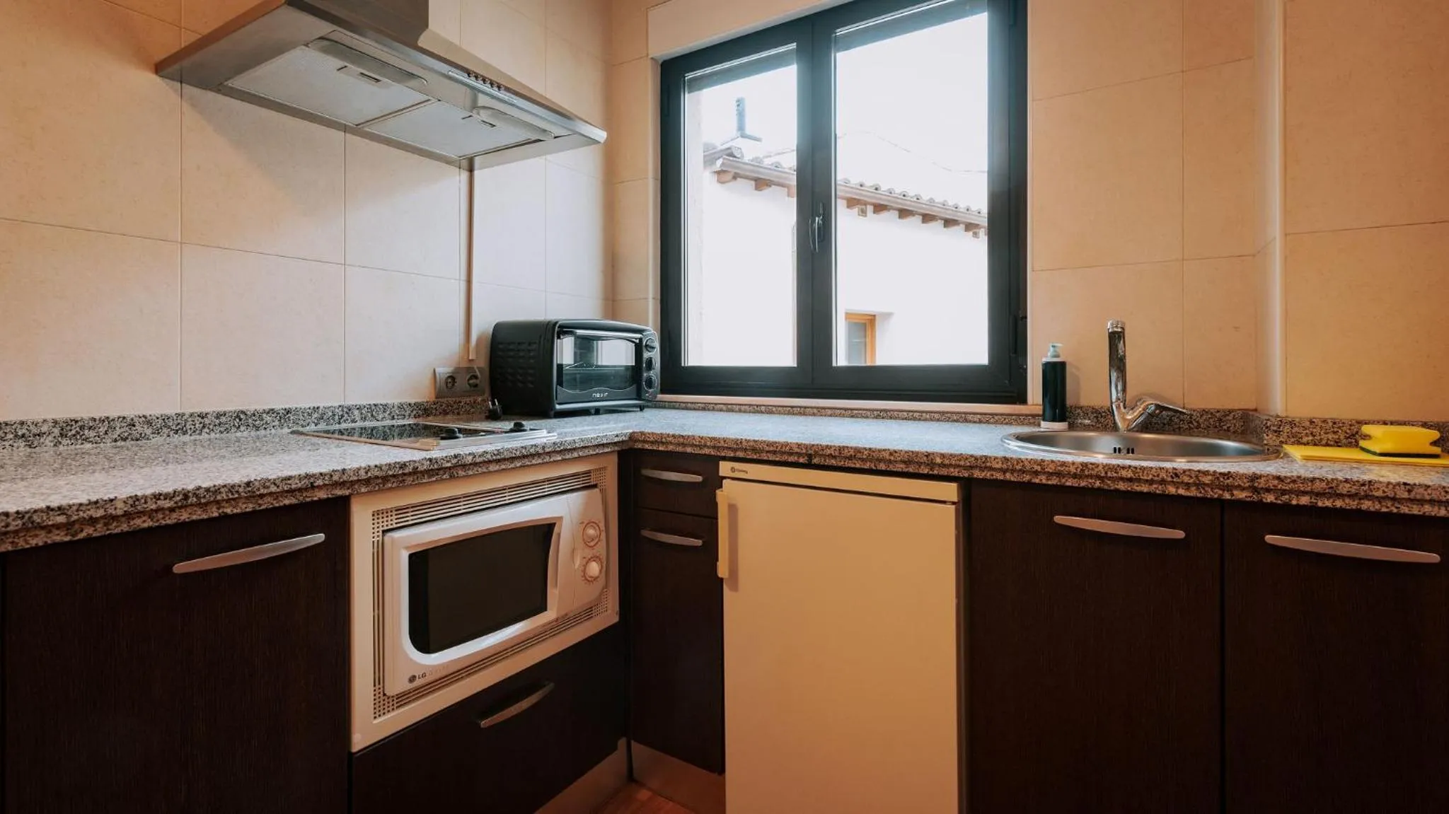 Kitchen or kitchenette in JCH Congreso Apartamentos