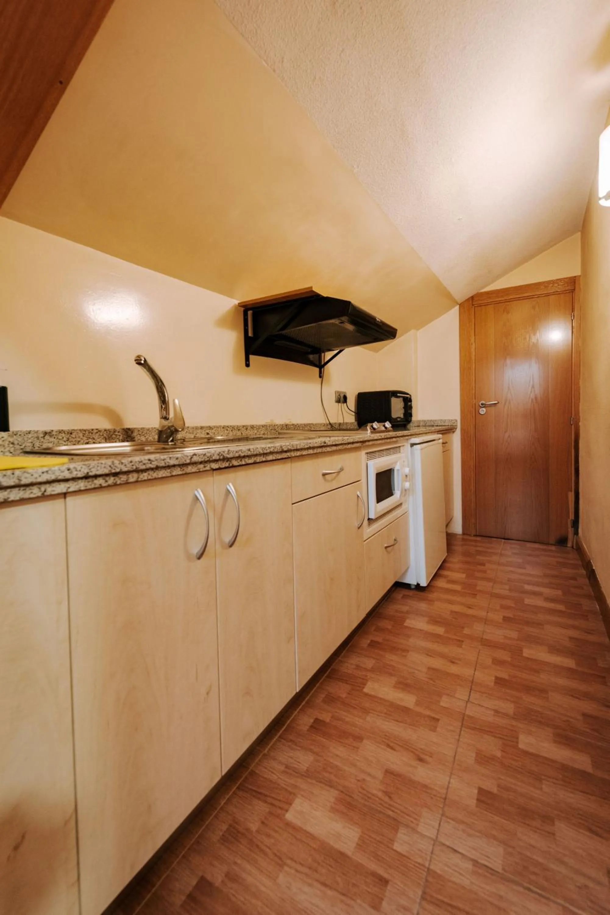 Kitchen or kitchenette in JCH Congreso Apartamentos