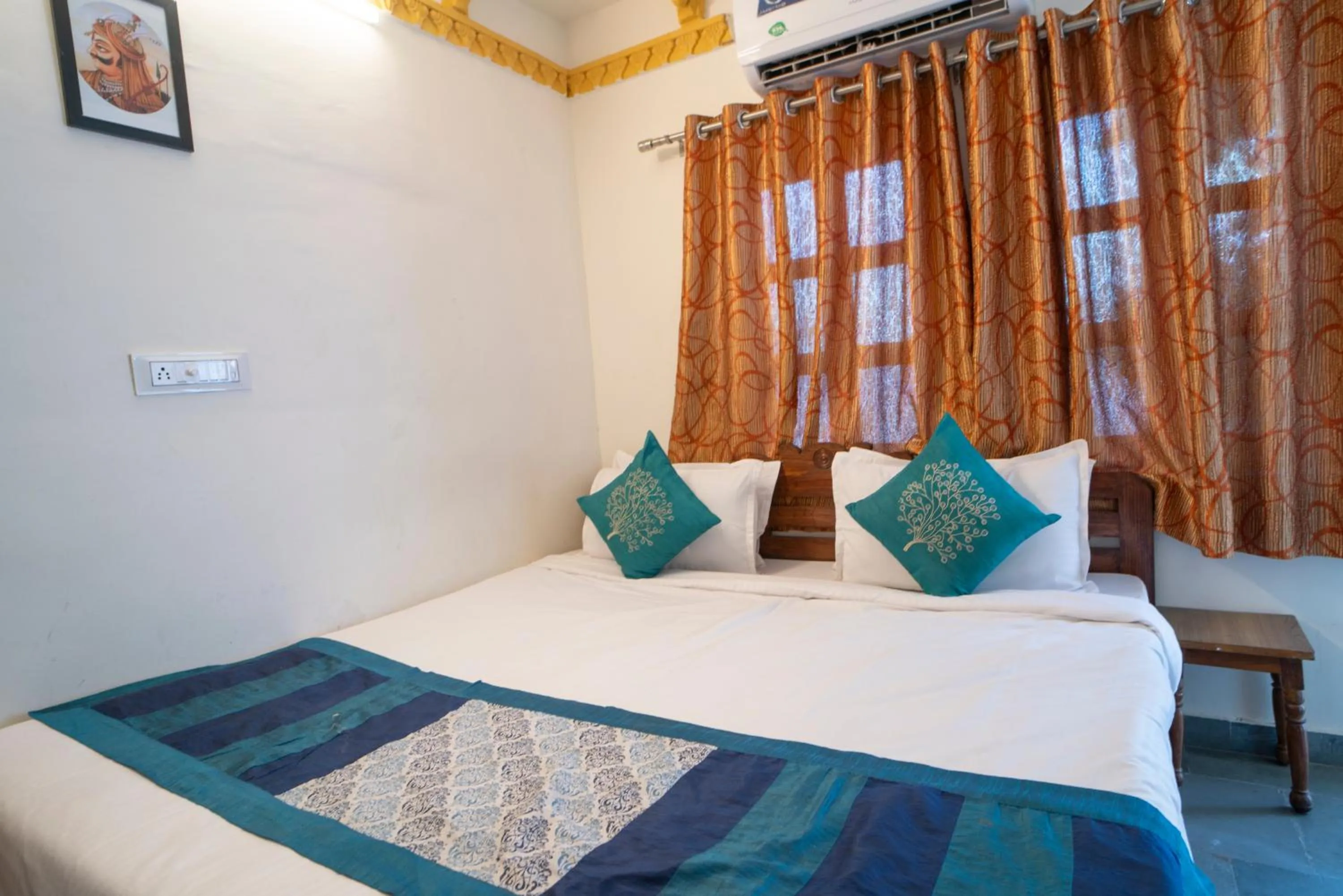 Bed in Hotel Ambavgarh Palace