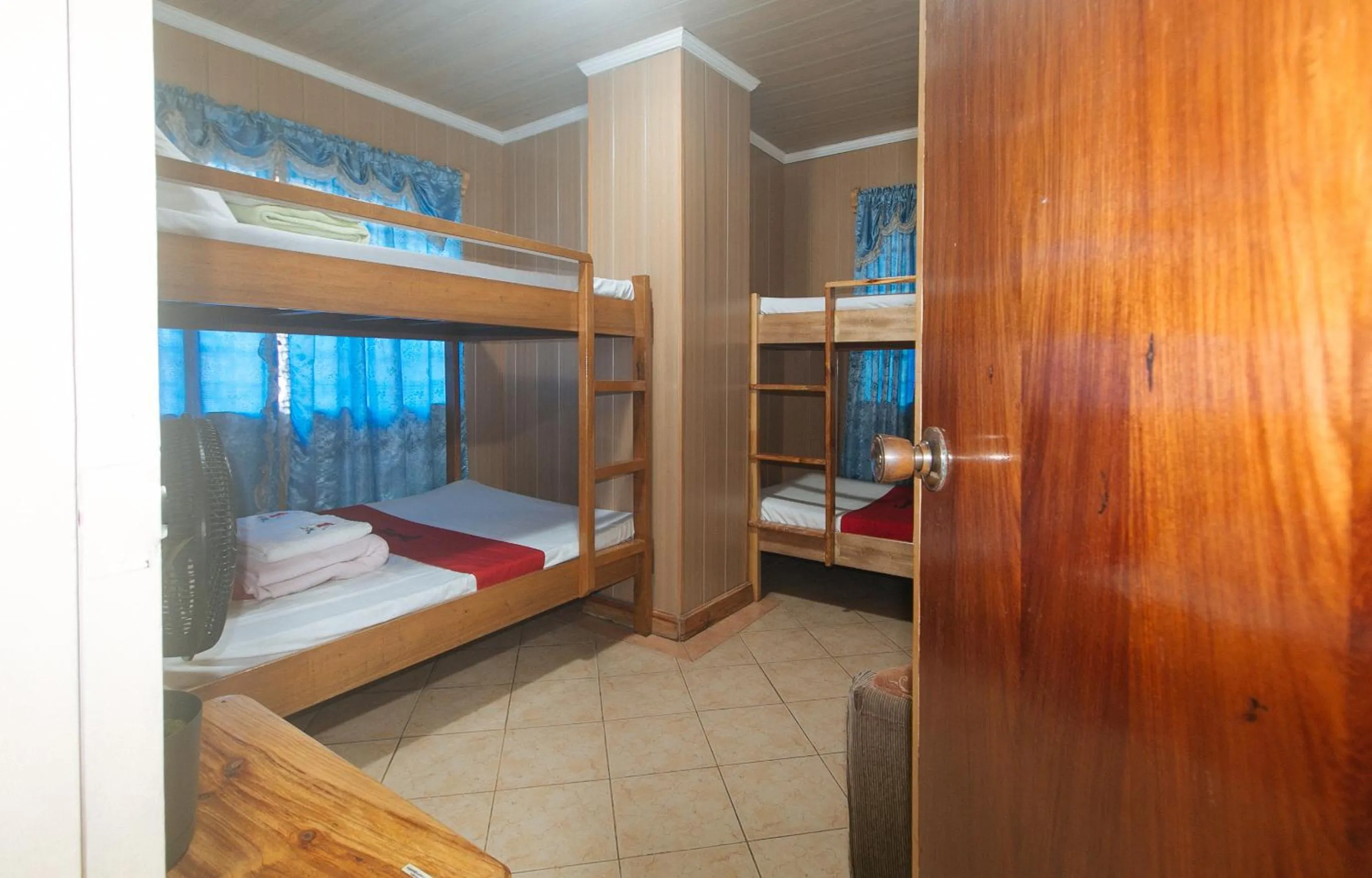 Photo of the whole room, Bed in RedDoorz Hostel @ Faes Transient House