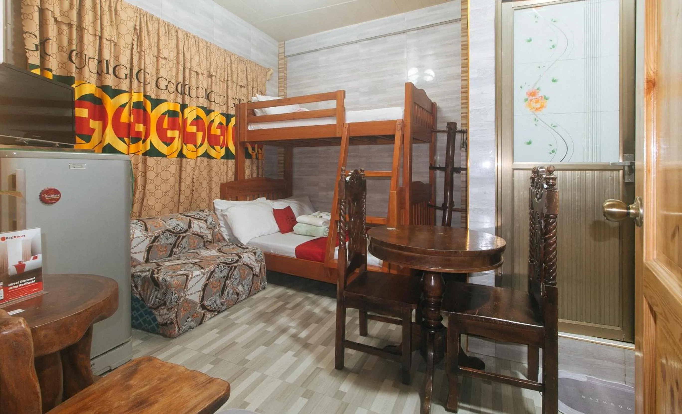 Photo of the whole room, Bed in RedDoorz Hostel @ Faes Transient House