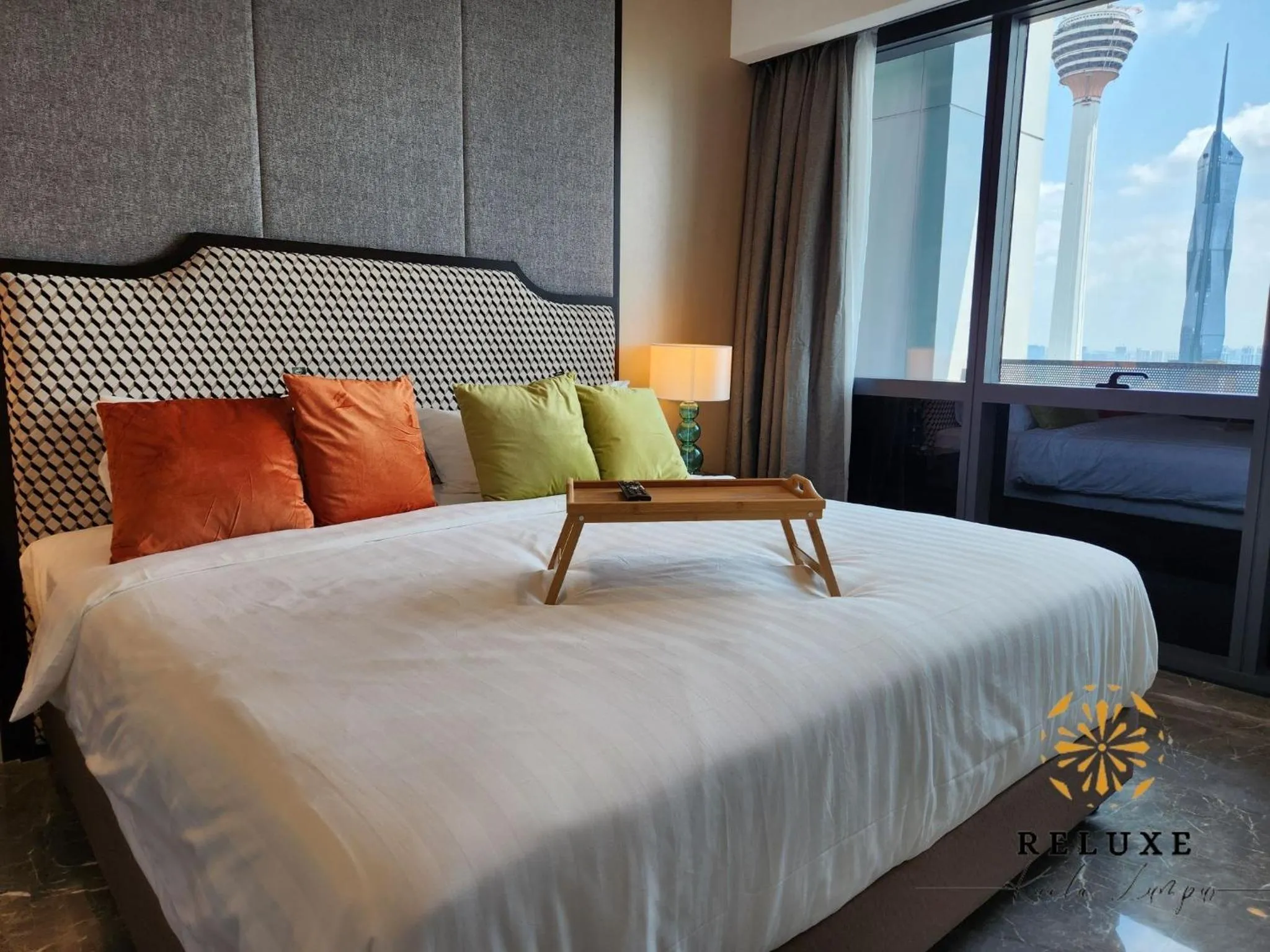Bed in The Platinum 2 Premium Suite by Reluxe