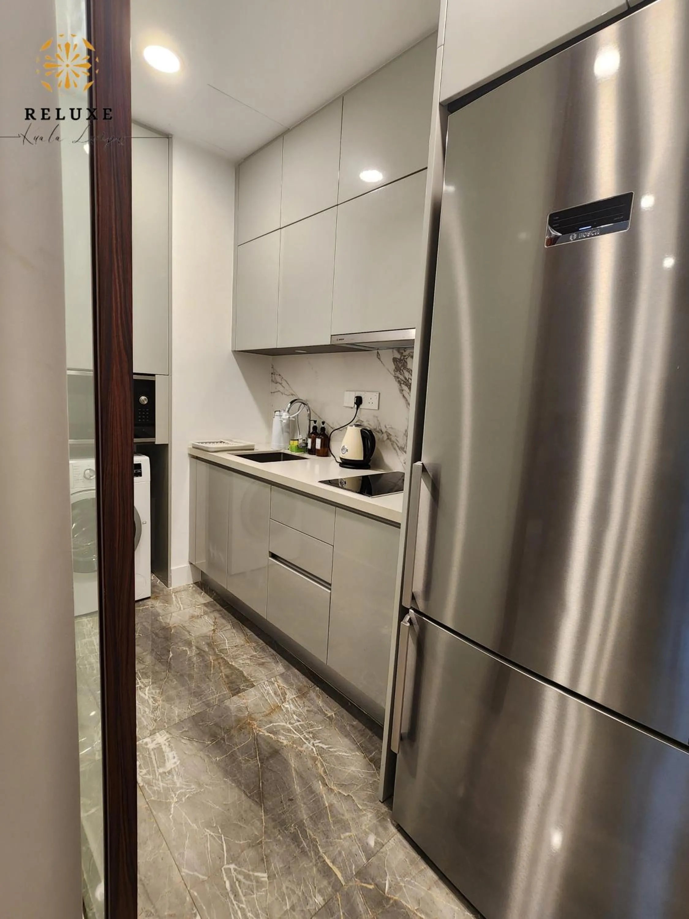 kitchen in The Platinum 2 Premium Suite by Reluxe