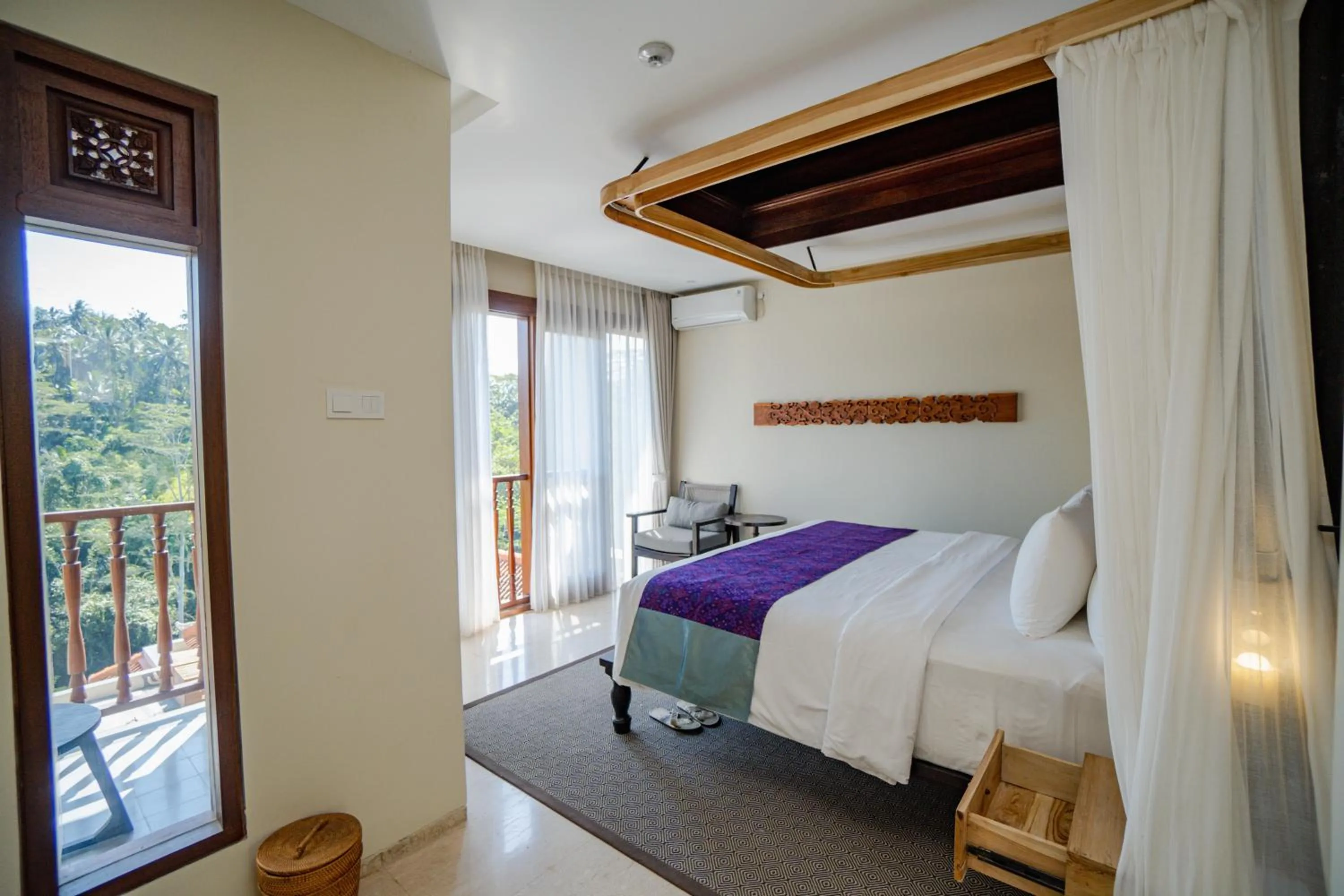 Bed in Horison Ume Suites & Villas