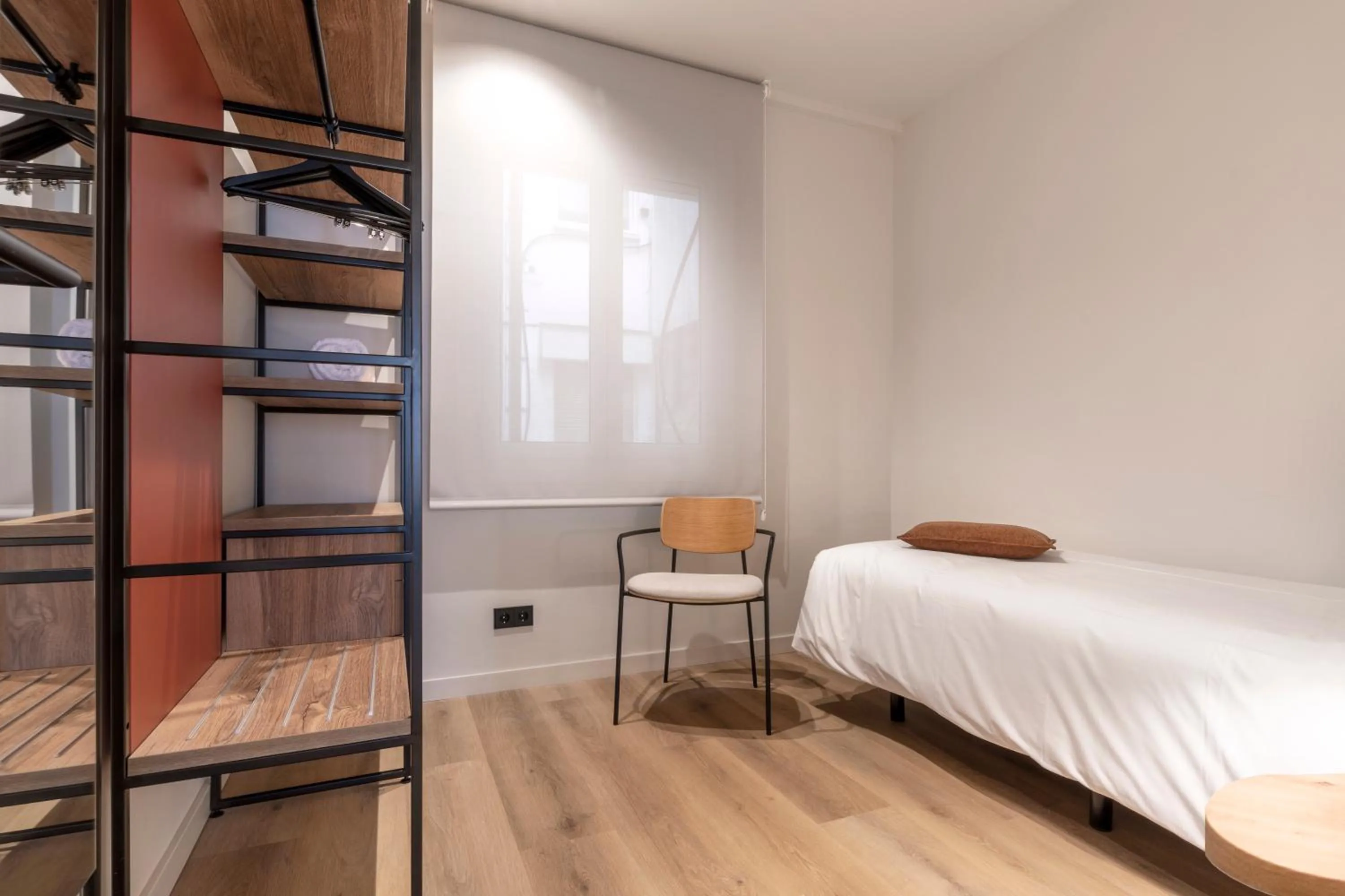 Bed in Arrivo Apartments