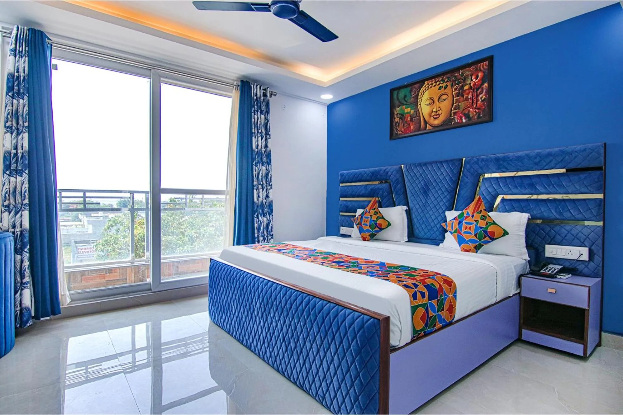 Bed in FabHotel Satyam International