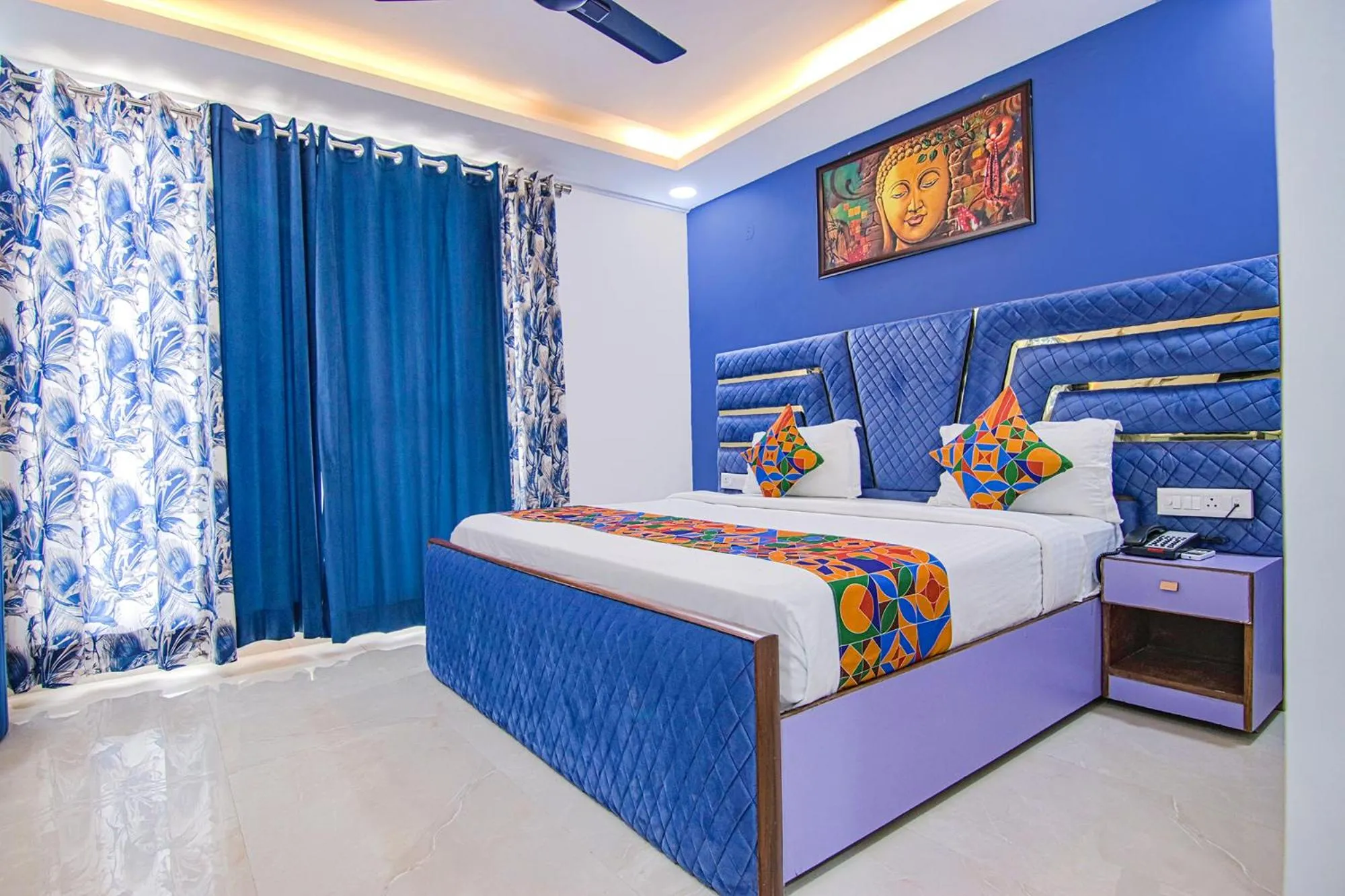 Bed in FabHotel Satyam International