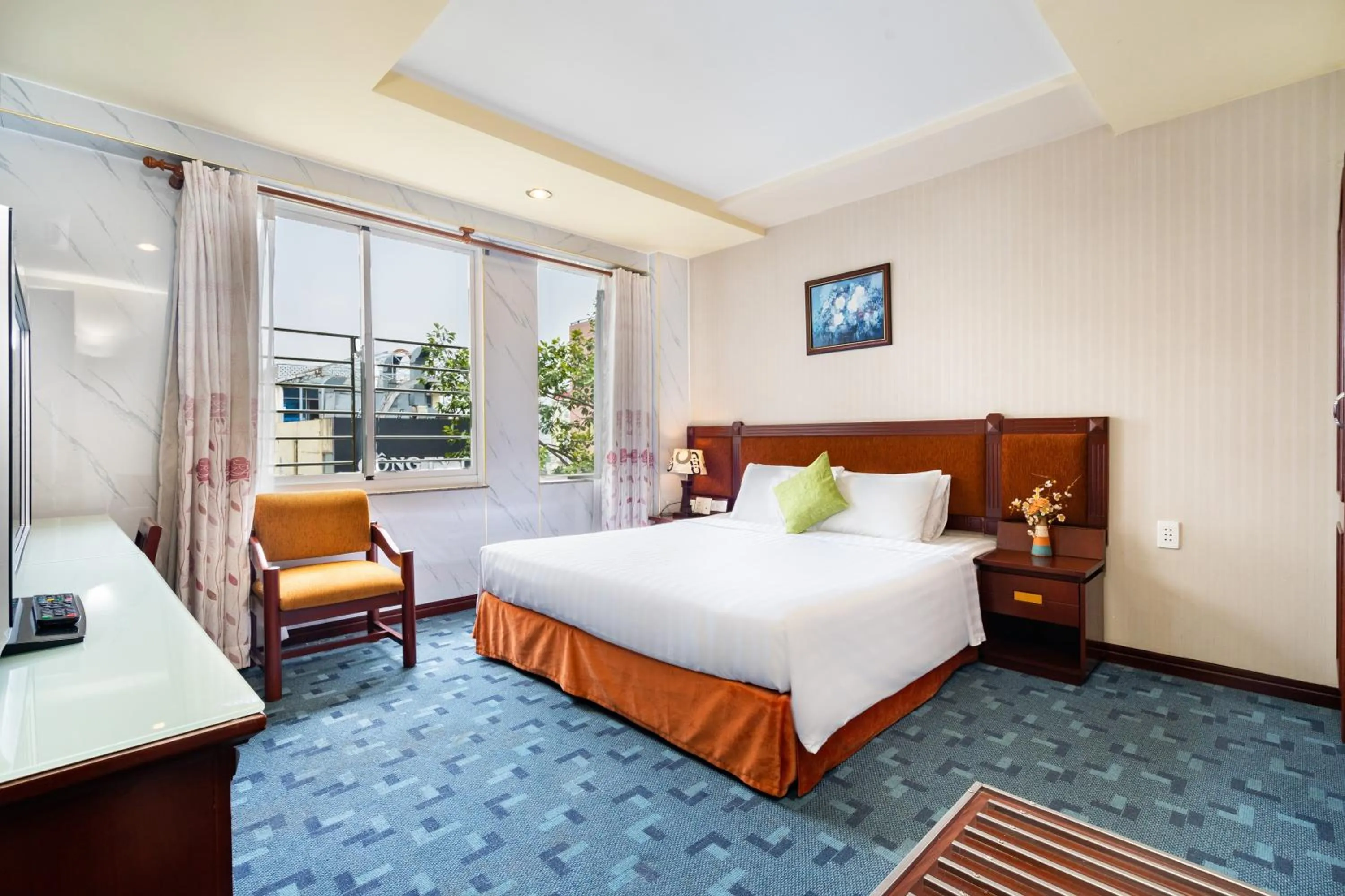 Bed in LUCASTA SAIGON Hotel