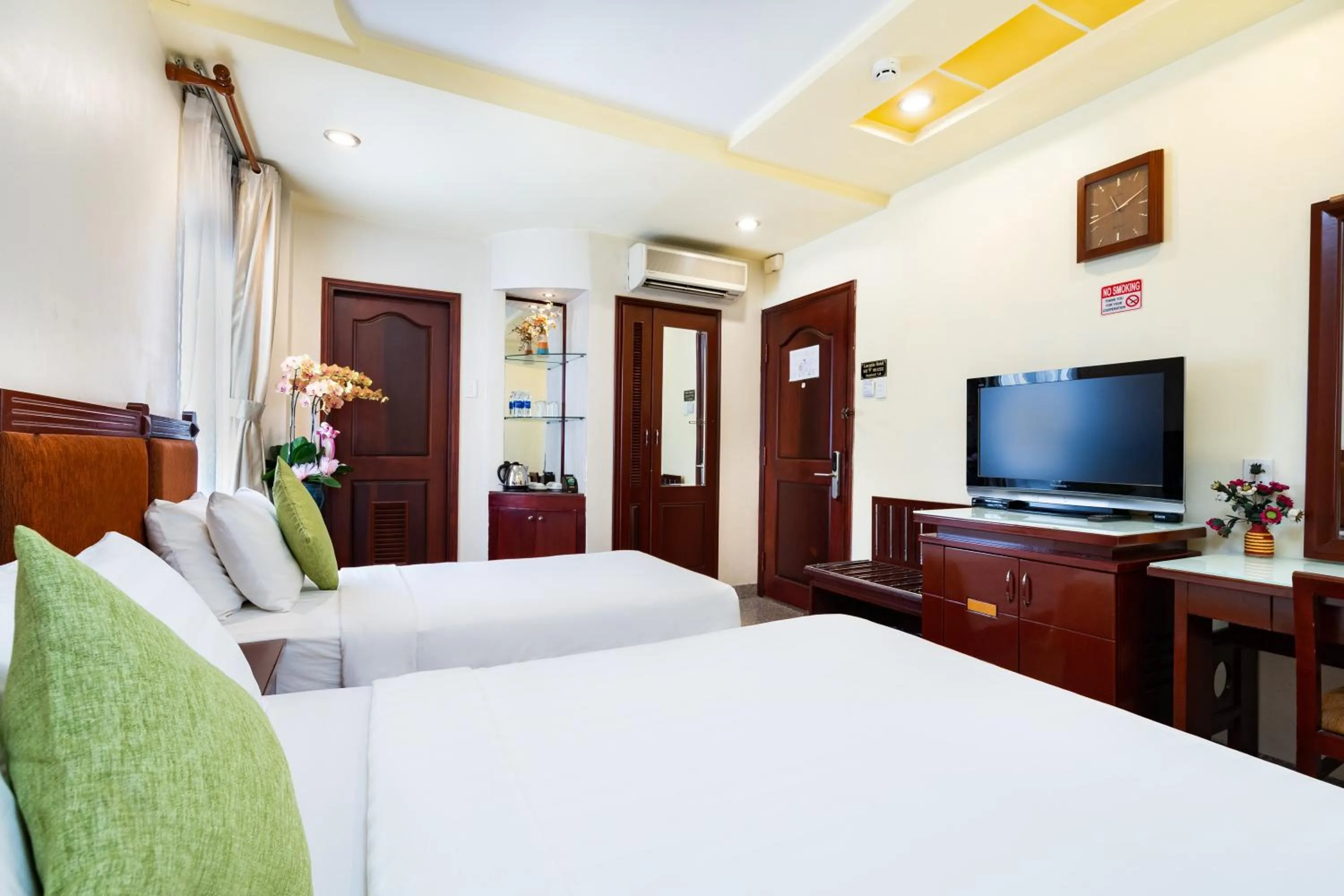 Communal lounge/ TV room, Bed in LUCASTA SAIGON Hotel