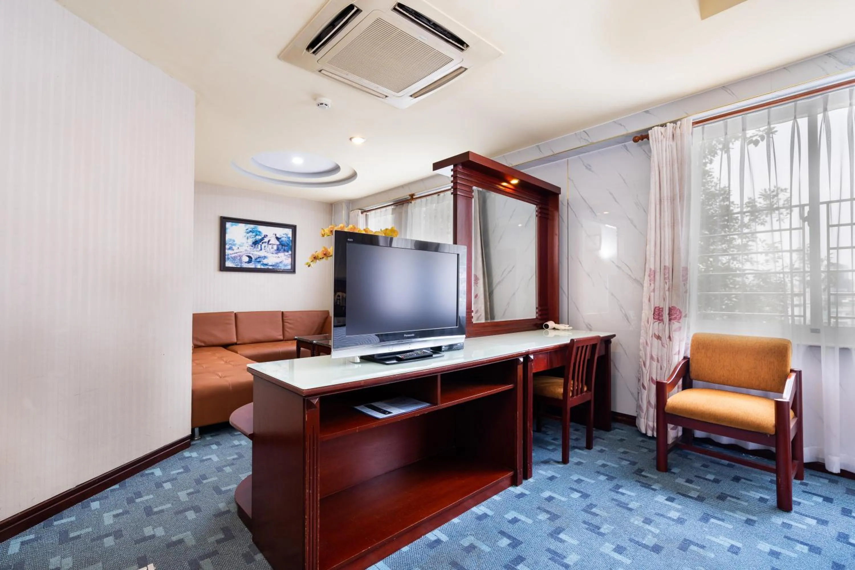 Communal lounge/ TV room in LUCASTA SAIGON Hotel