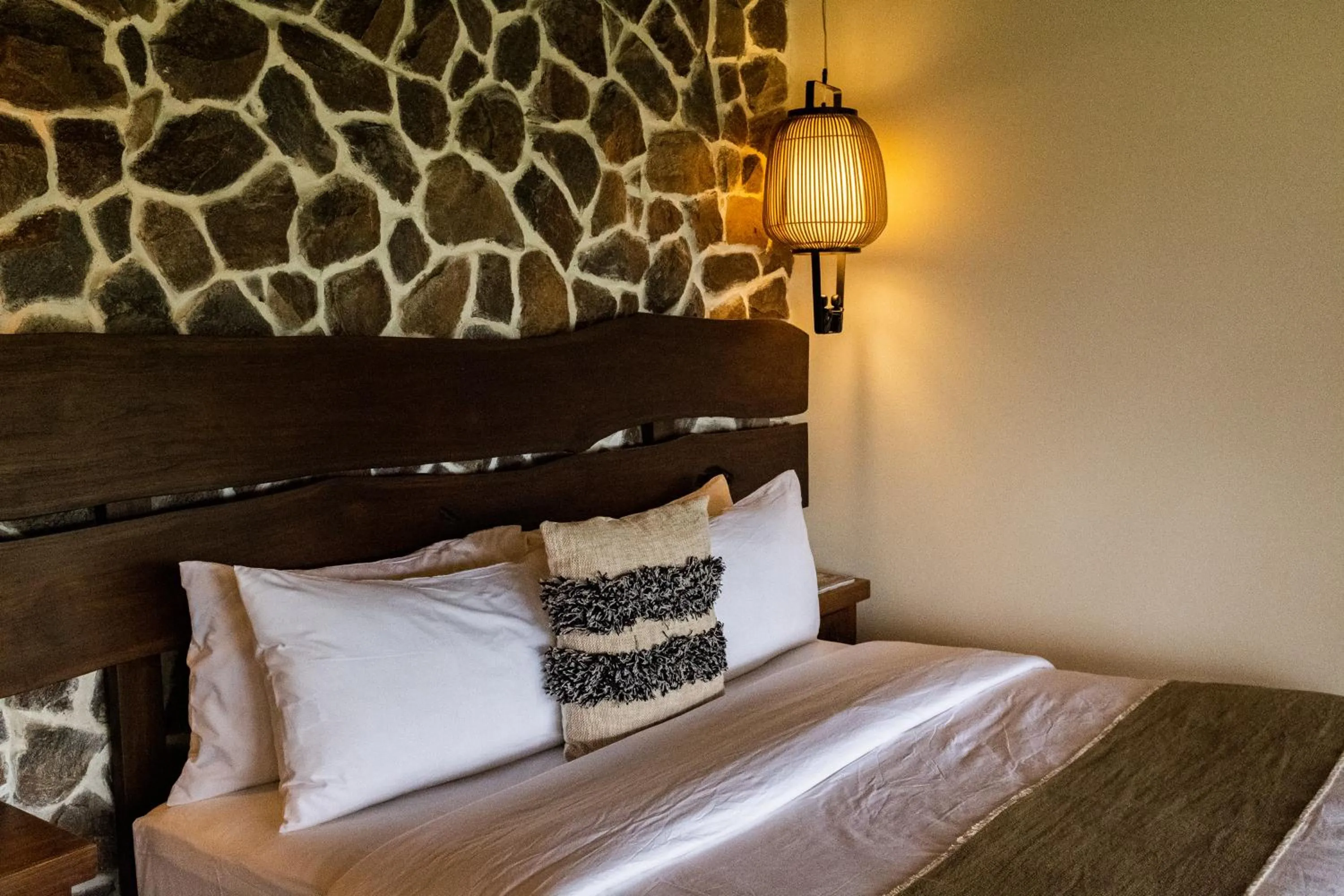 Bed in La Joya Farm Resort & Spa
