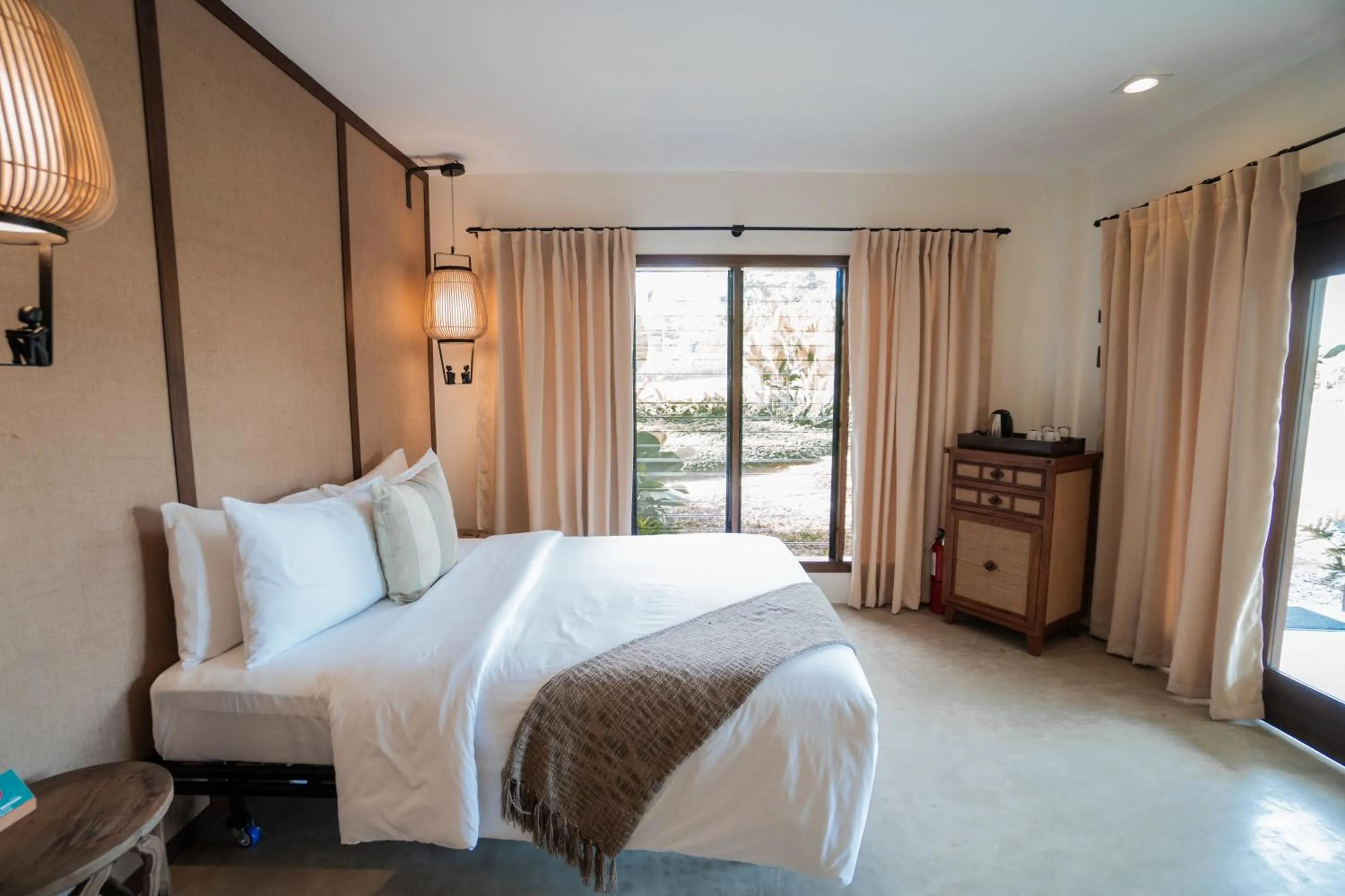 Bed in La Joya Farm Resort & Spa