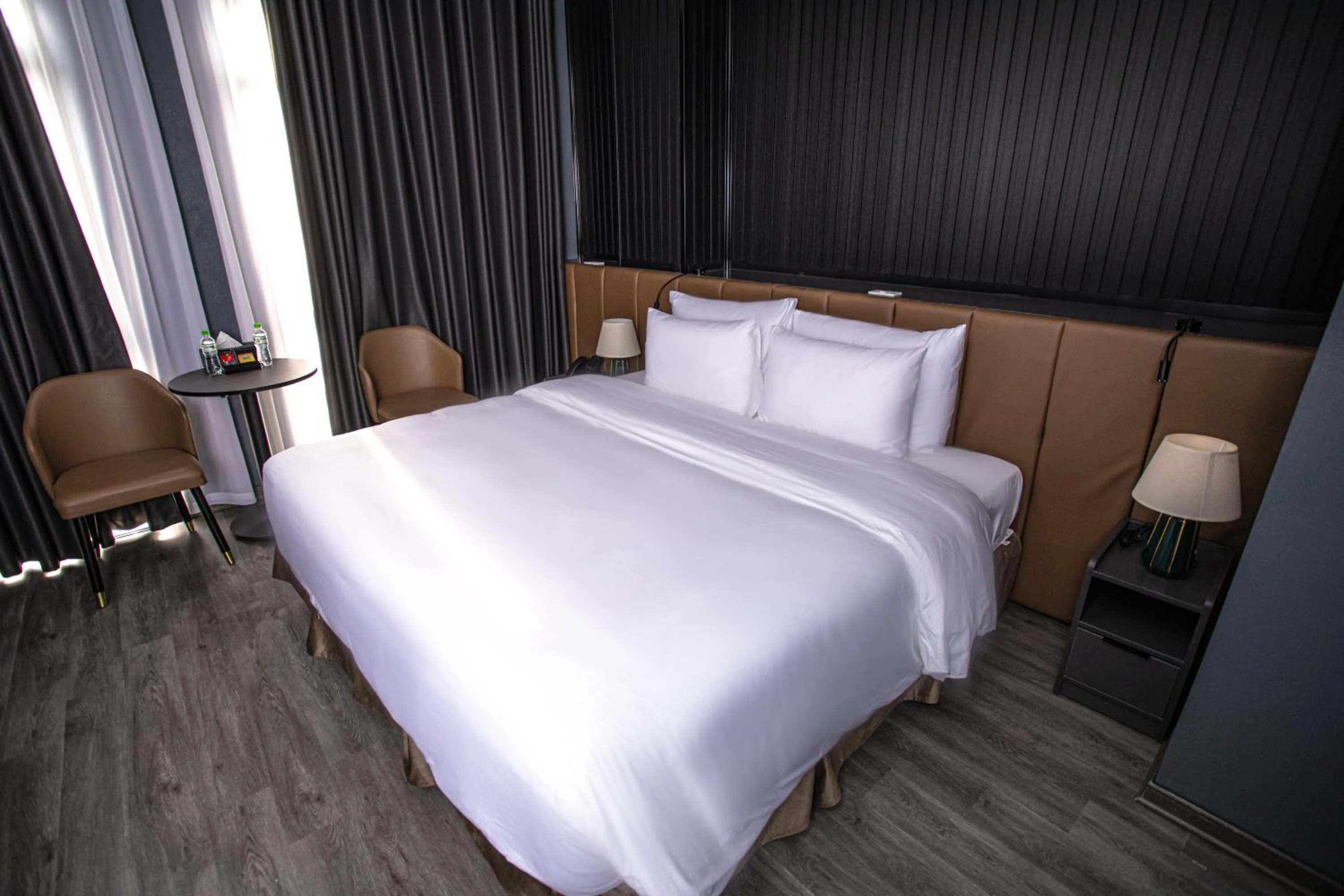 Bed in La Maison Boutique Hotel