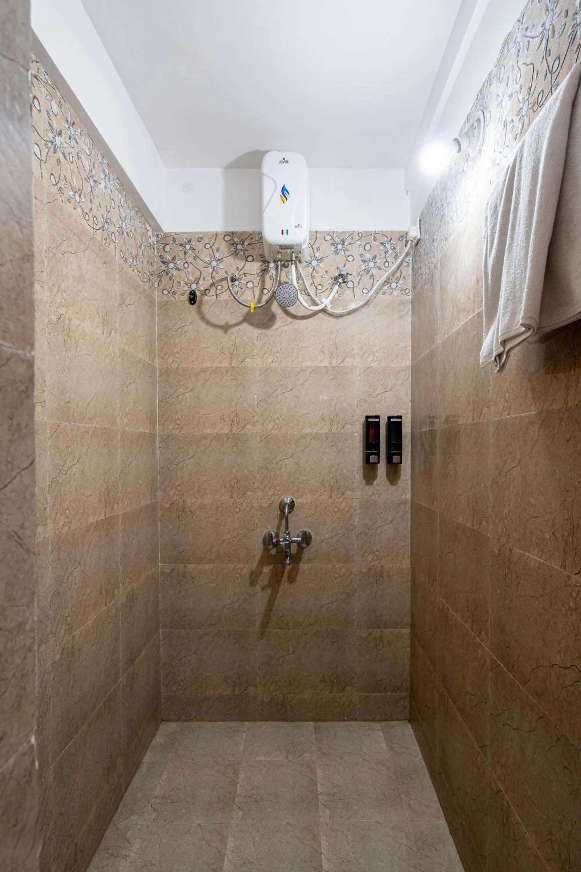Shower in StayBird - Silver Oak, An Apartment Hotel, Kharadi