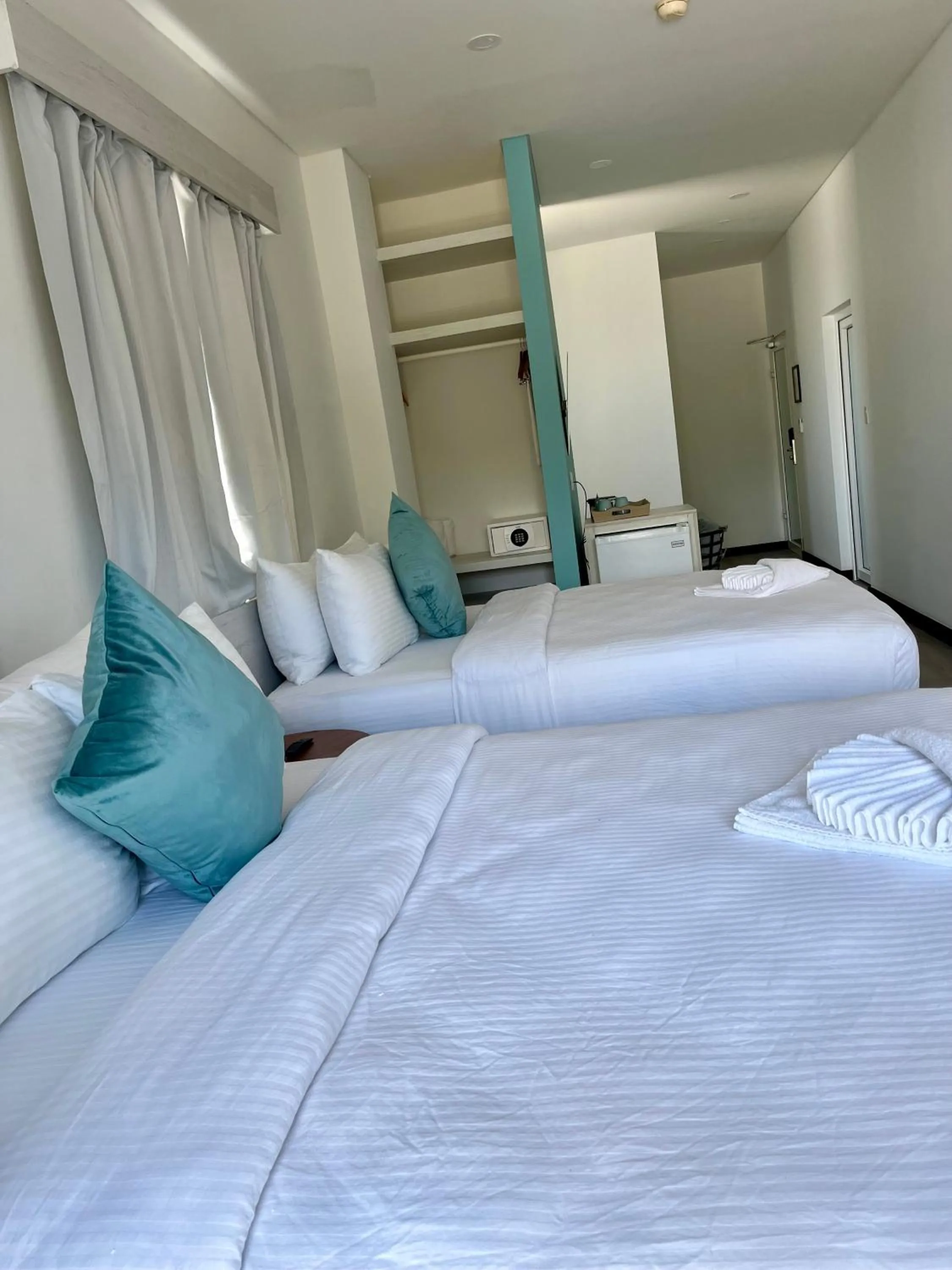 Bed in The Watermark Hotel